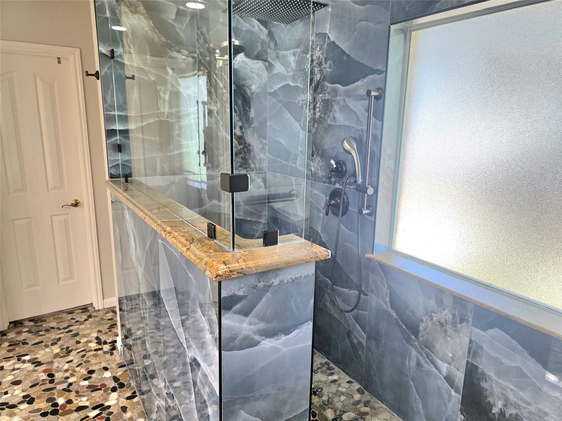220 April Waters Drive W, Montgomery, TX 77356 Enjoy this gorgeous walk in shower that is wheel chair accessible