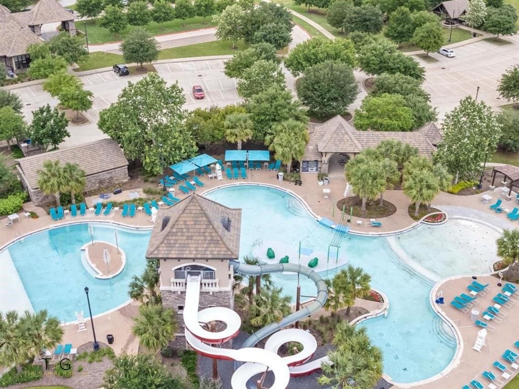 5103 Jackson Ponds Court, Sugar Land, TX 77479 This community offers a pool with a large, winding water slide.