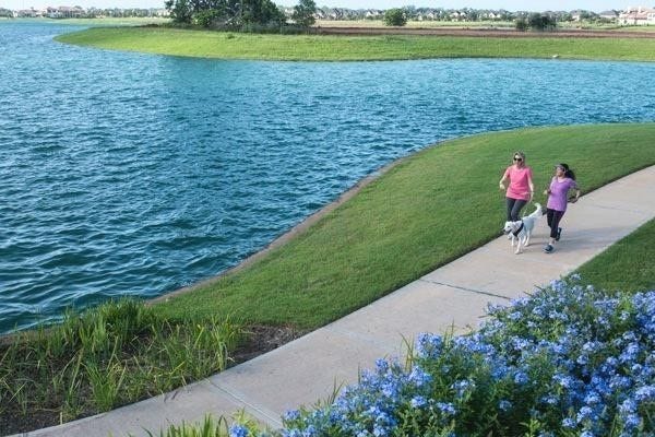 5103 Jackson Ponds Court, Sugar Land, TX 77479 This community offers a lakeside setting with walking paths that are perfect for leisurely strolls.