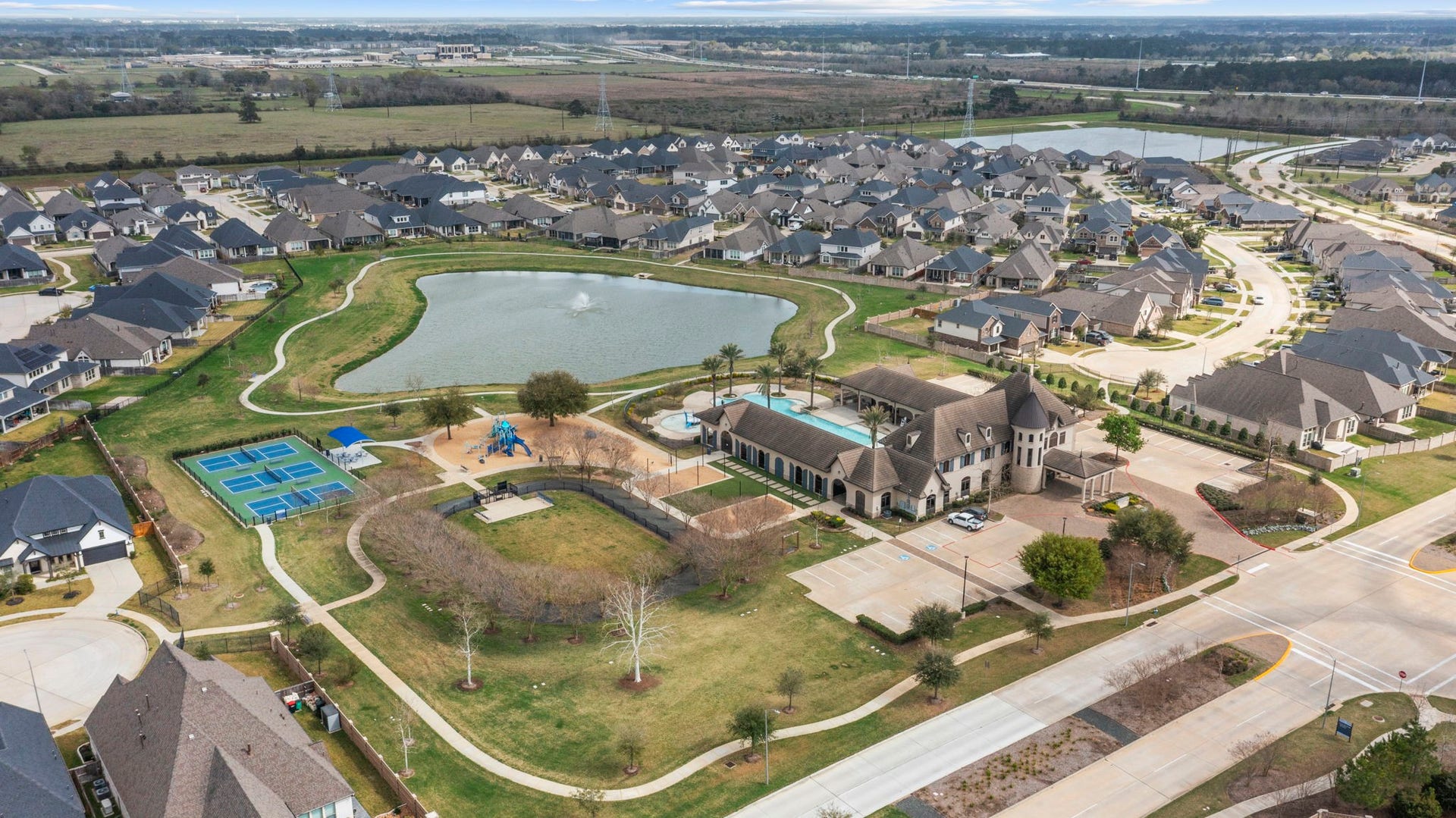19314 Trotting Green Trail, Tomball, TX 77377 A bird's eye view of the Amira Resort where you can enjoy pickleball, swimming, gym, dog park, playground and clubhouse.