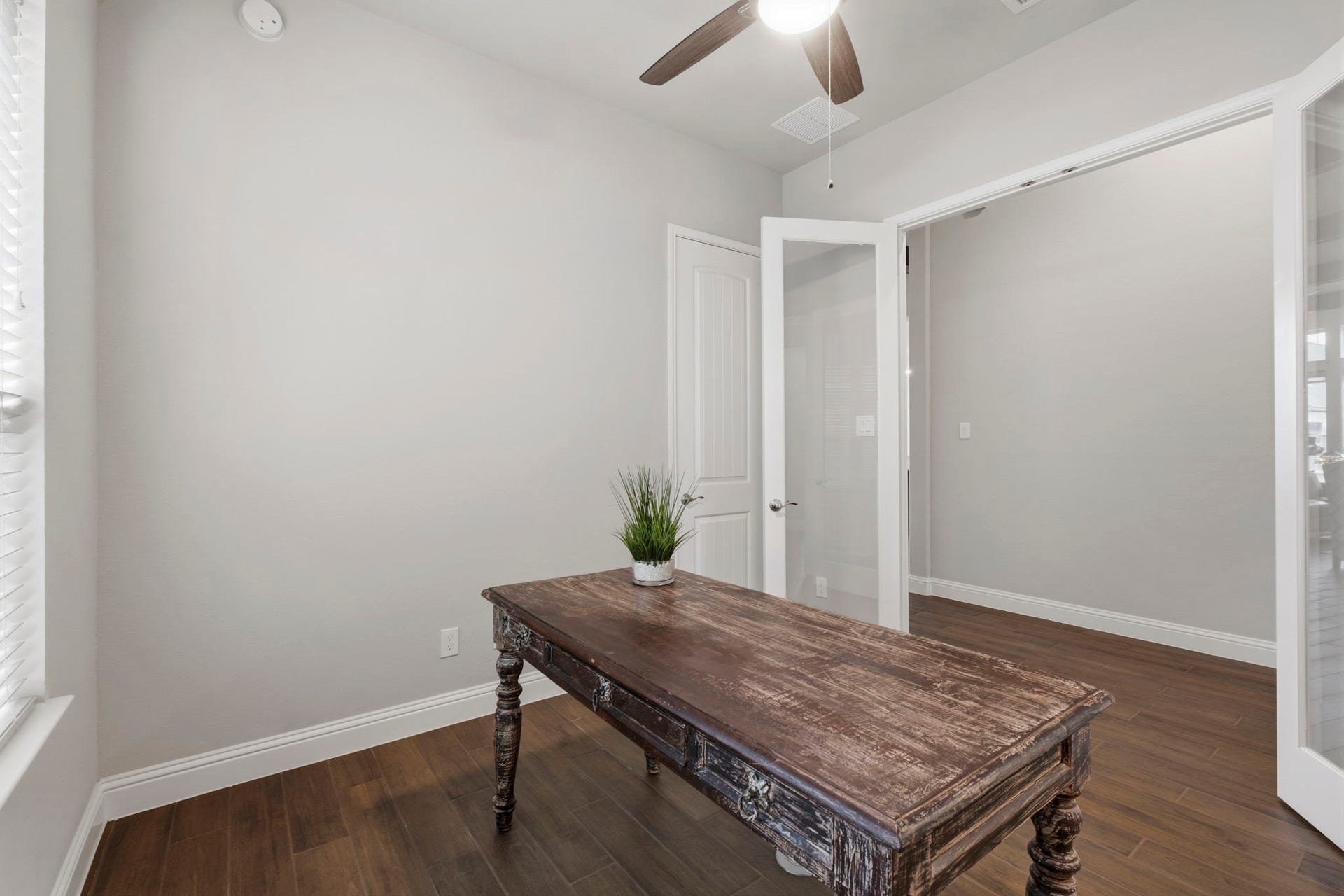 19314 Trotting Green Trail, Tomball, TX 77377 The flexroom has a closet, ceiling fan and double french doors