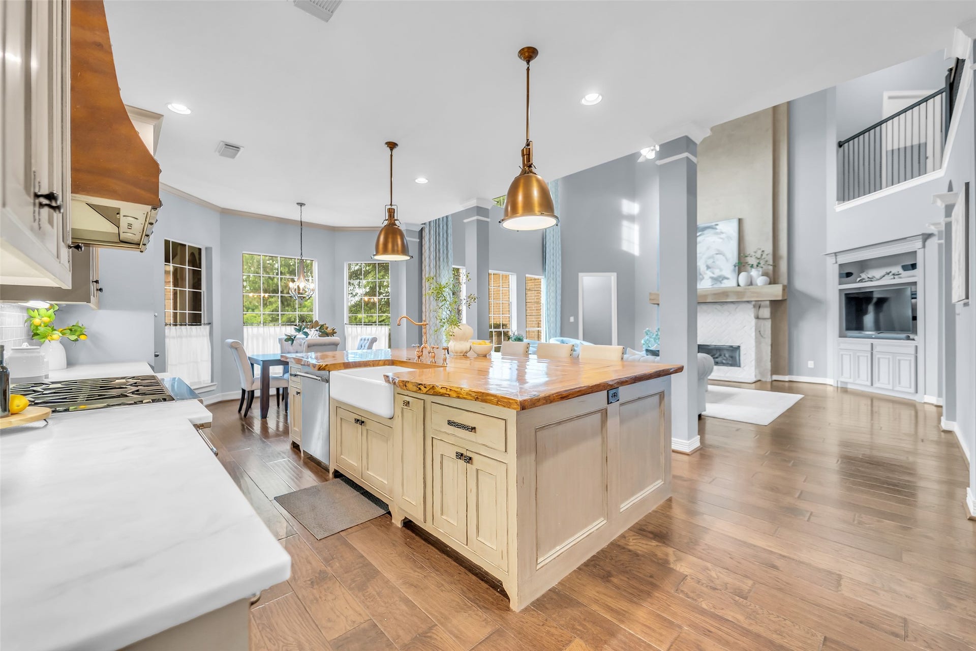 8703 Stones Throw Lane, Missouri City, TX 77459 There is more! - honed marble countertops, glass-tile backsplash, pots and pan drawers, pull-out spice drawers, built-in microwave, LG refrigerator-freezer and a pantry closet with a custom shelving system!