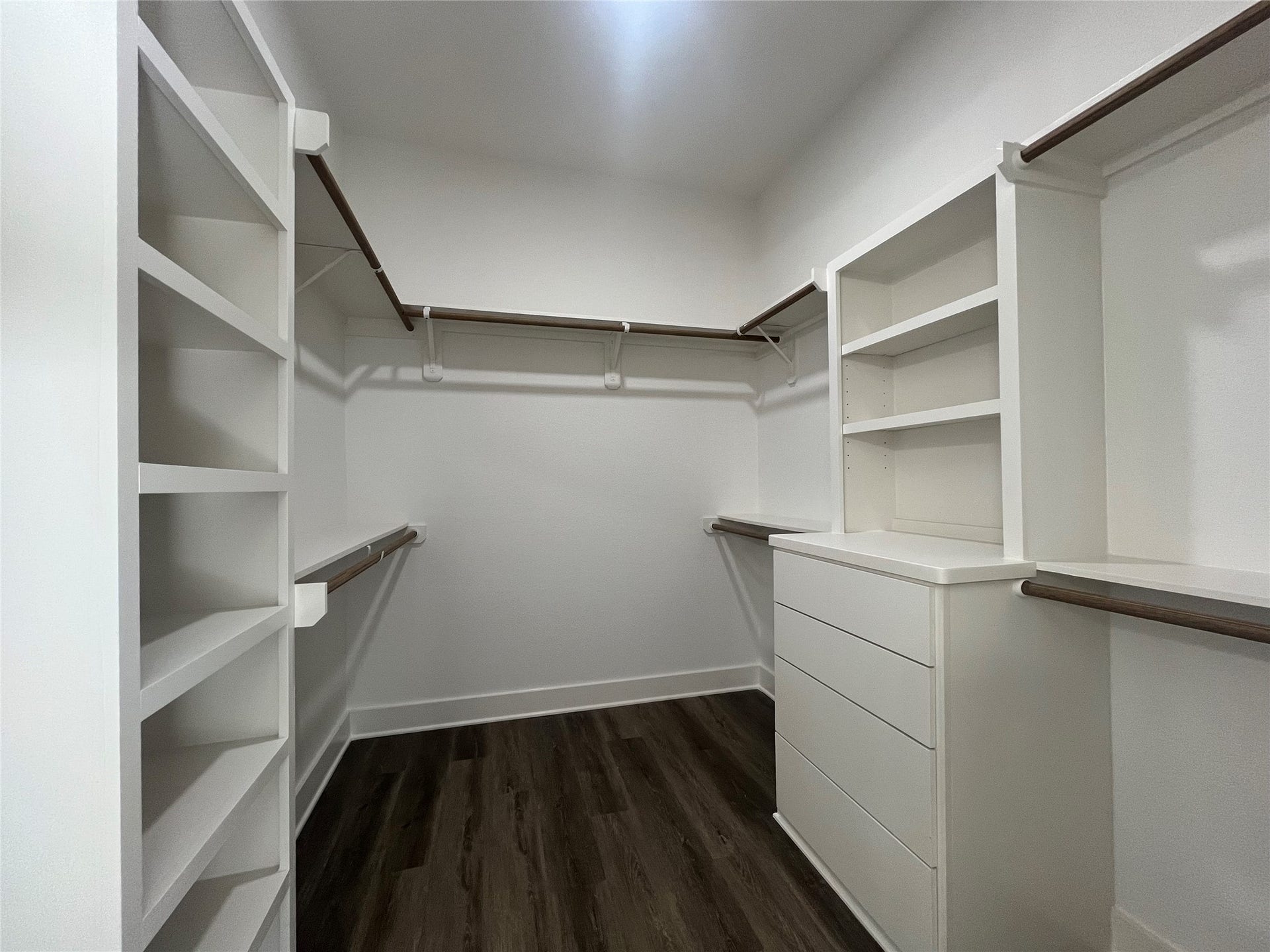28807 Champion Oaks Dr, Magnolia, TX 77354 28807 Champion Oak primary walk-in closet with built in shelves and drawers