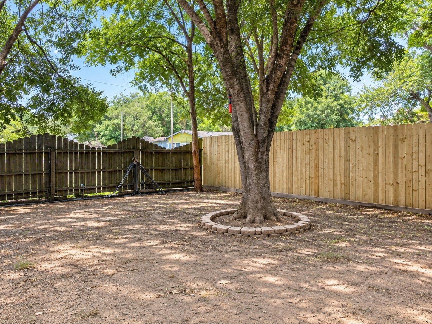 7403 Backstrom Street, Hitchcock, TX 77563 another view of fully fenced in backyard.