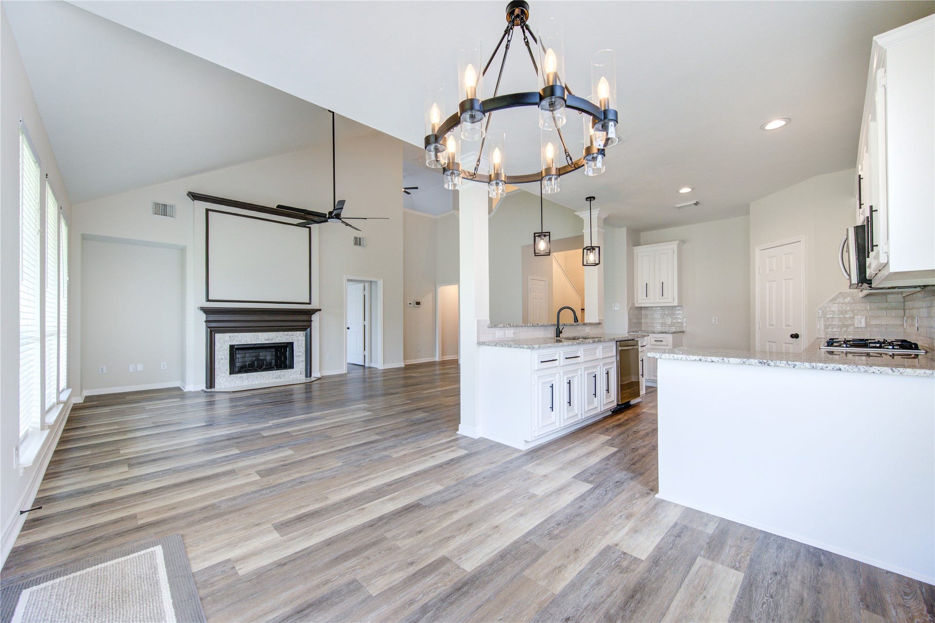 20911 Golden Sycamore Trail, Cypress, TX 77433 Stunning open-concept view showcases the beautifully remodeled kitchen, breakfast area, and expansive family room all flowing seamlessly togetheran impressive space for everyday living and entertaining.