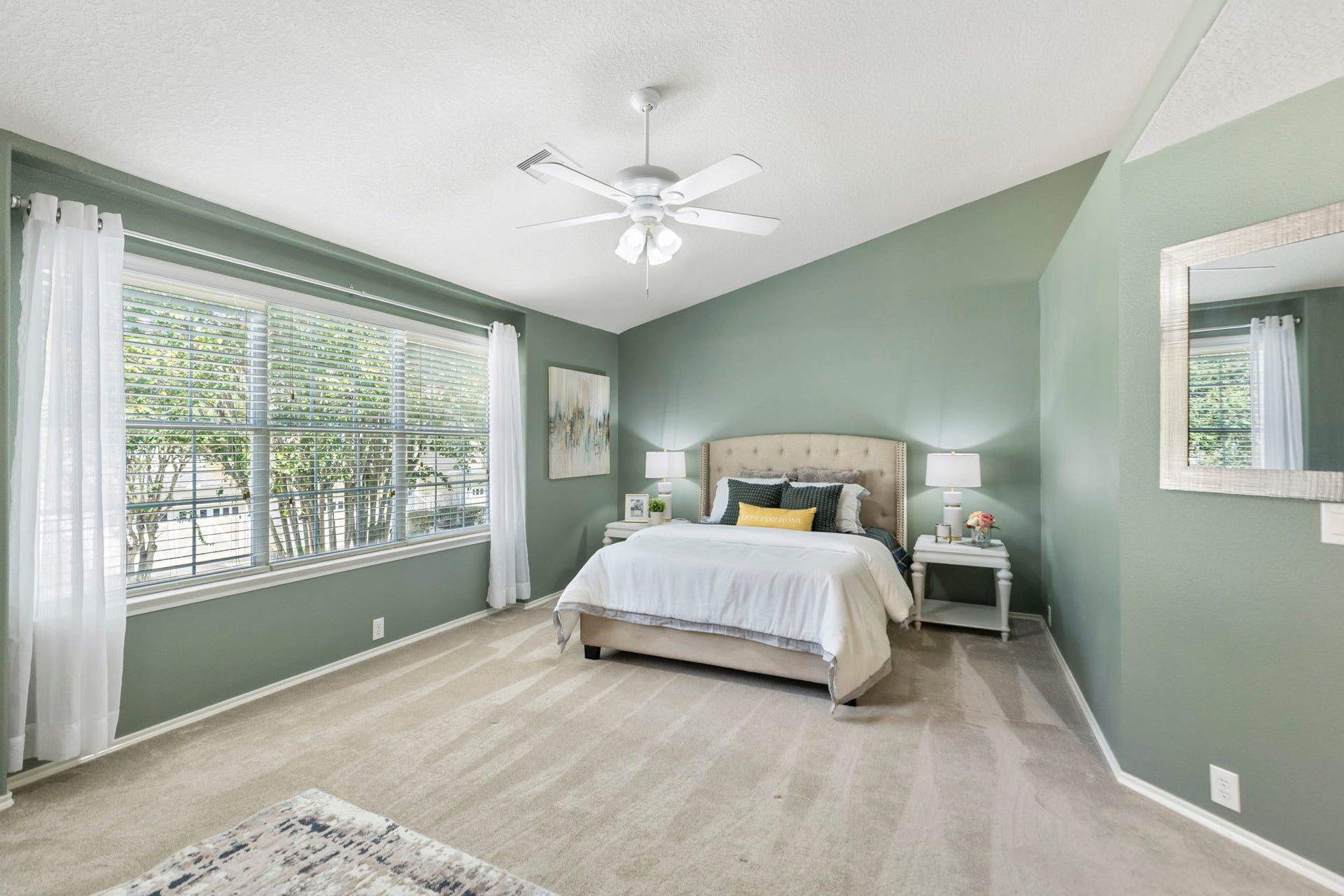 13600 Breton Ridge Street, #11A, Houston, TX 77070 Where do I begin? This primary bedroom has everything you would ever want; vaulted ceiling, tree-top views, ceiling fan, soft carpeting and abundant natural light.