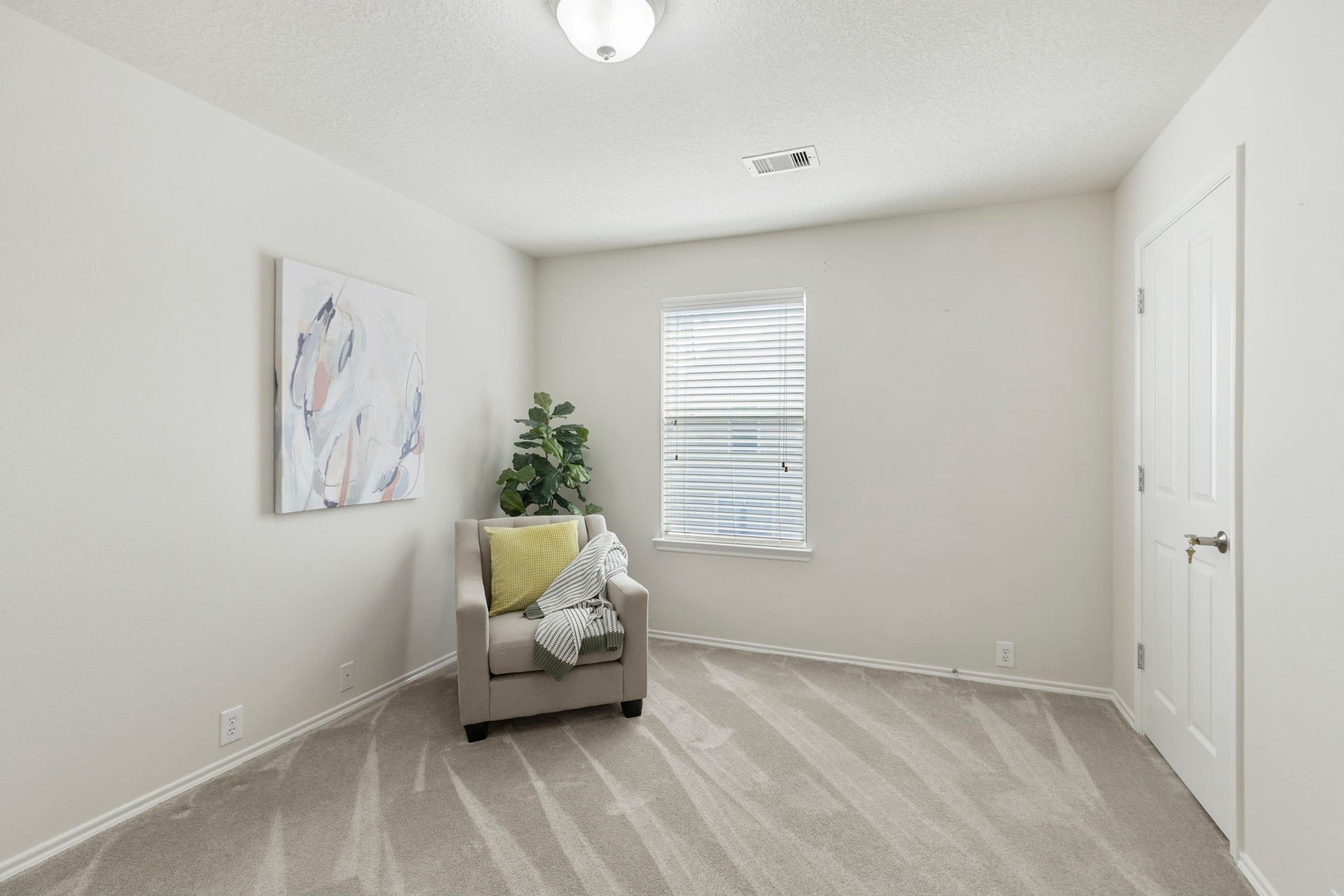 13600 Breton Ridge Street, #11A, Houston, TX 77070 The secondary upstairs bedroom includes soft carpet, window and two closets.