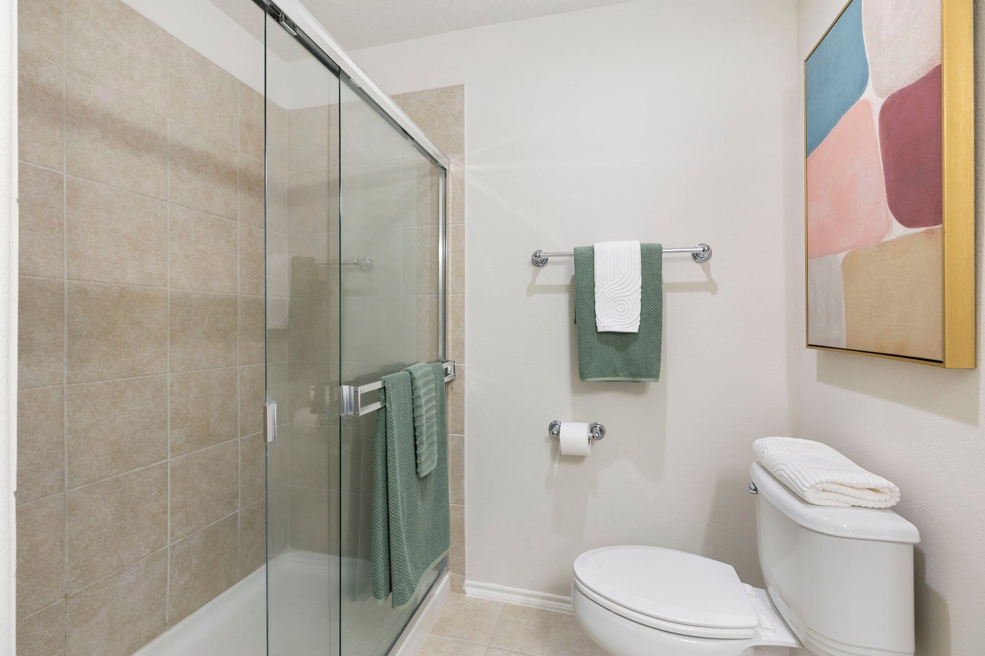 13600 Breton Ridge Street, #11A, Houston, TX 77070 Enjoy long showers in the glass enclosed, low maintenance tiled shower equipped with a dual use showerhead fixture.