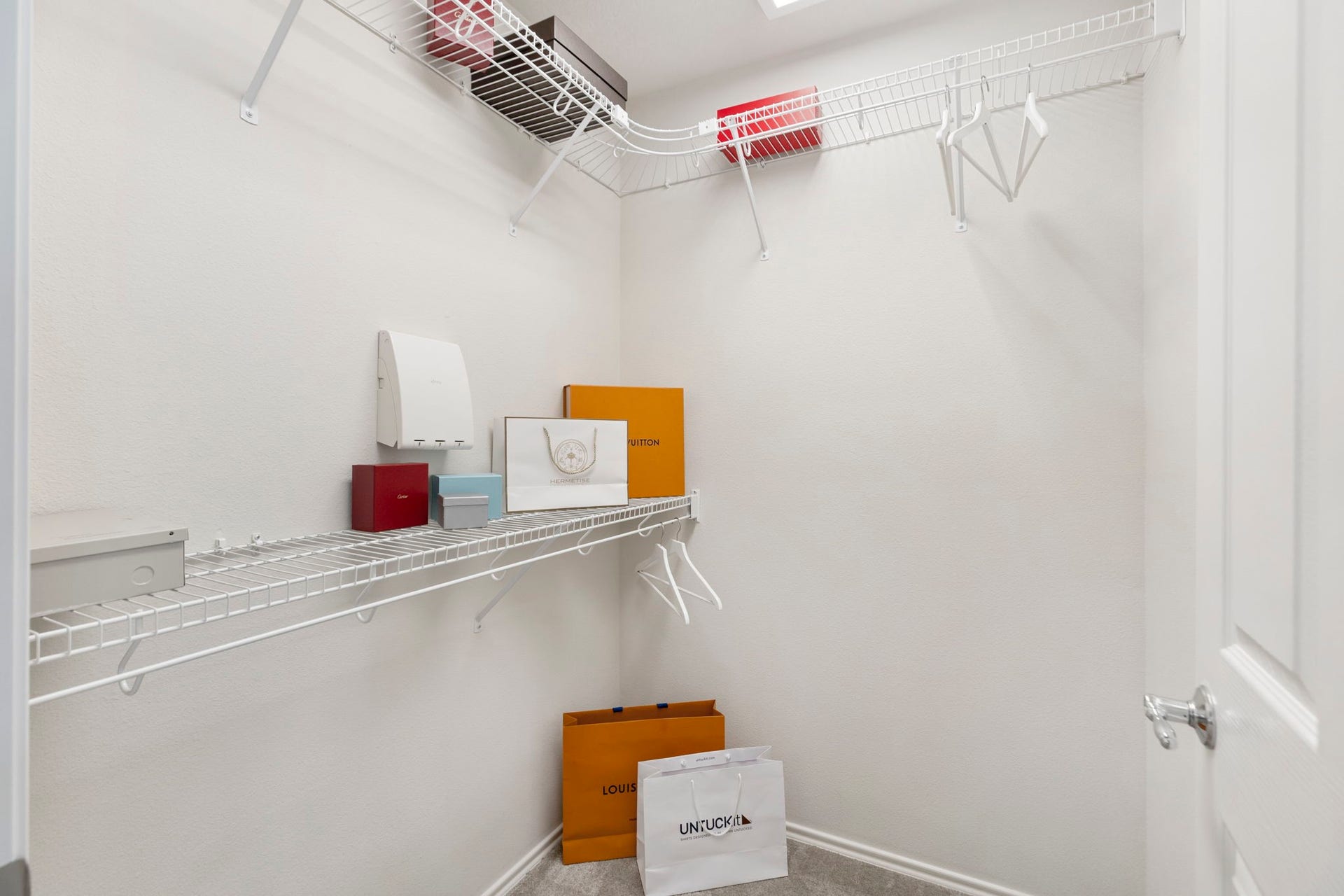 13600 Breton Ridge Street, #11A, Houston, TX 77070 The walk-in closet offers ample shelving and hanging space to keep everything organized and neat.