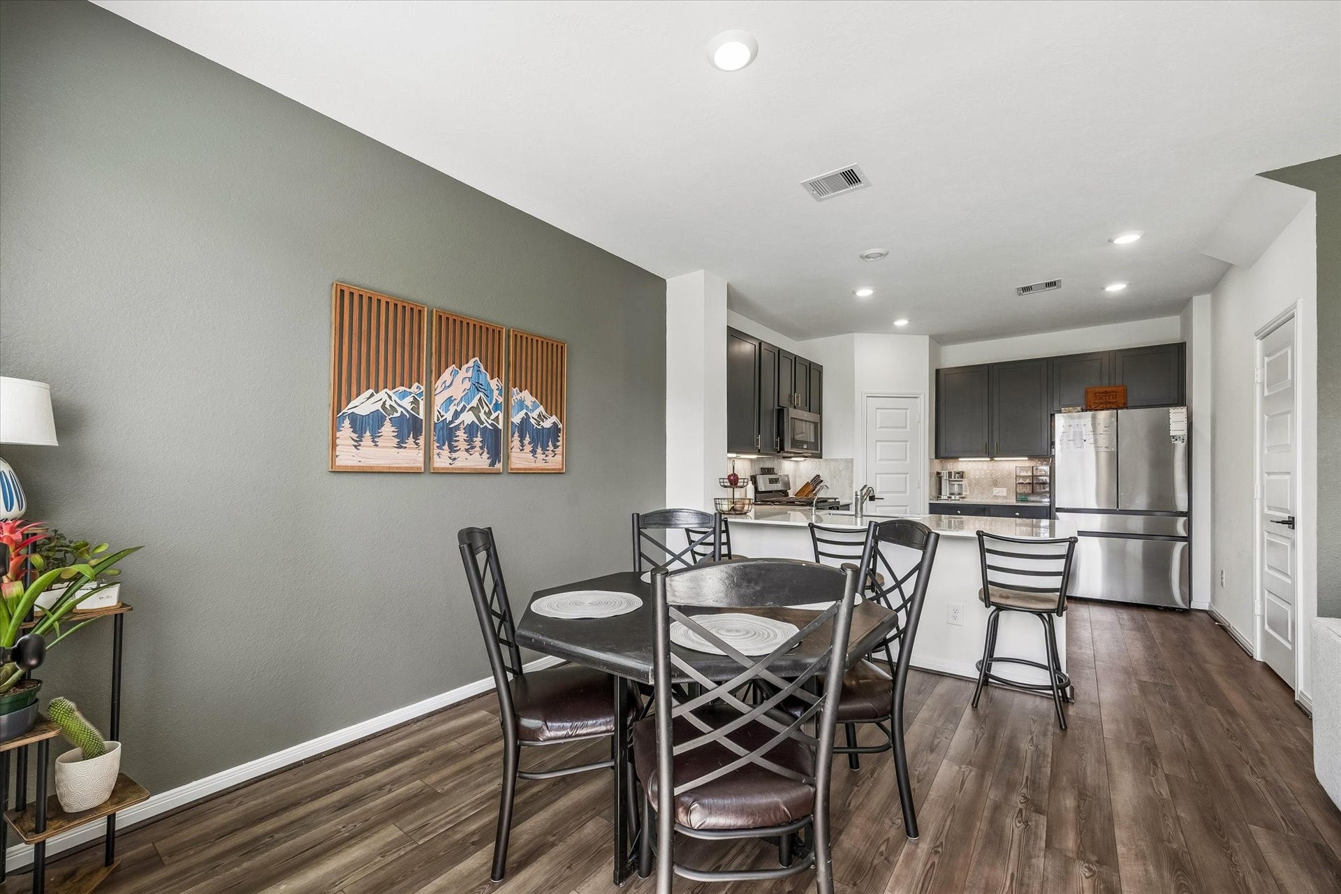 2852 Grand Anse Drive, Katy, TX 77493 Dining area flows effortlessly into the kitchen, creating a functional and inviting space for meals!