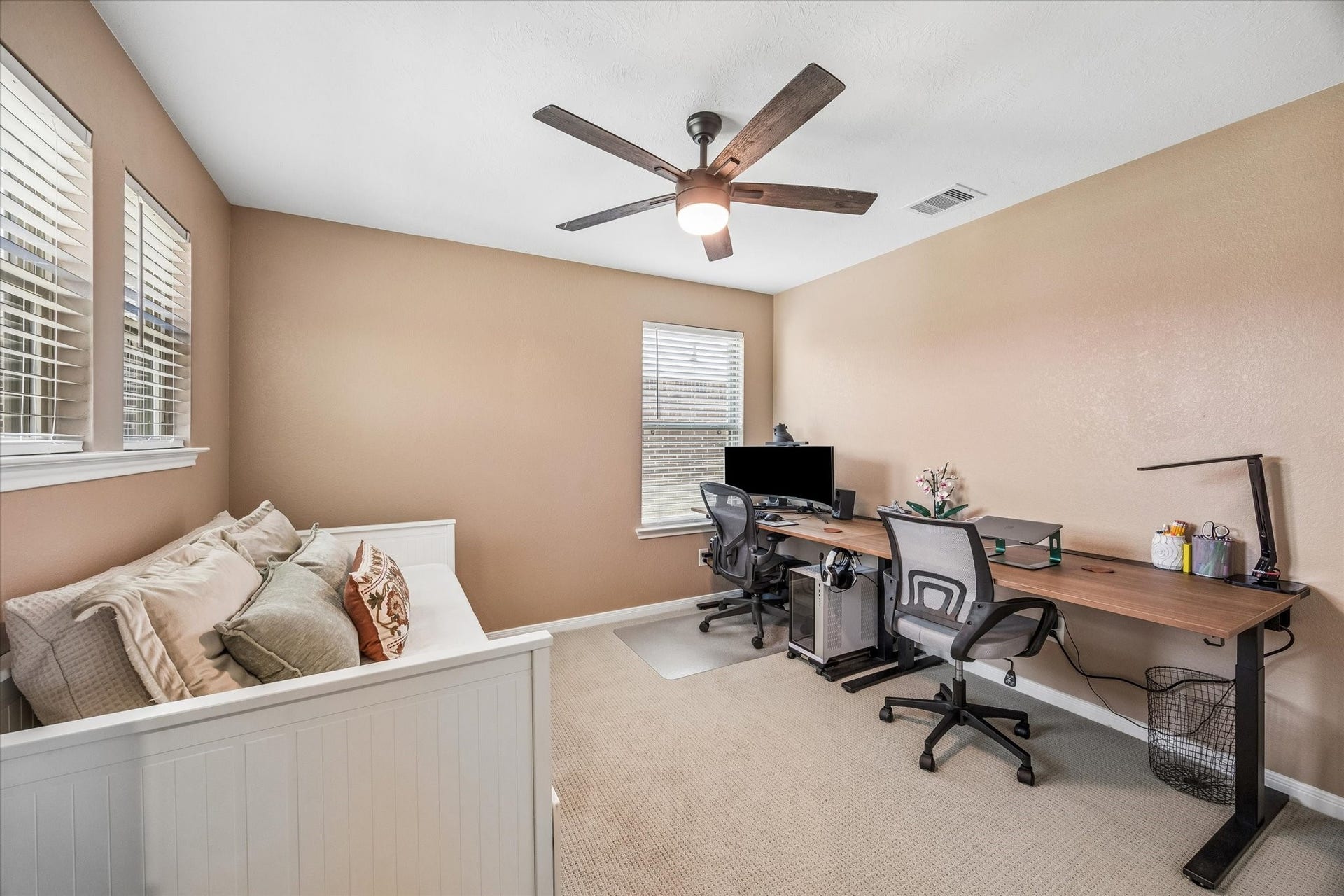 2852 Grand Anse Drive, Katy, TX 77493 Versatile third bedroom currently utilized as a home office, showcasing ample space for both work and relaxation.