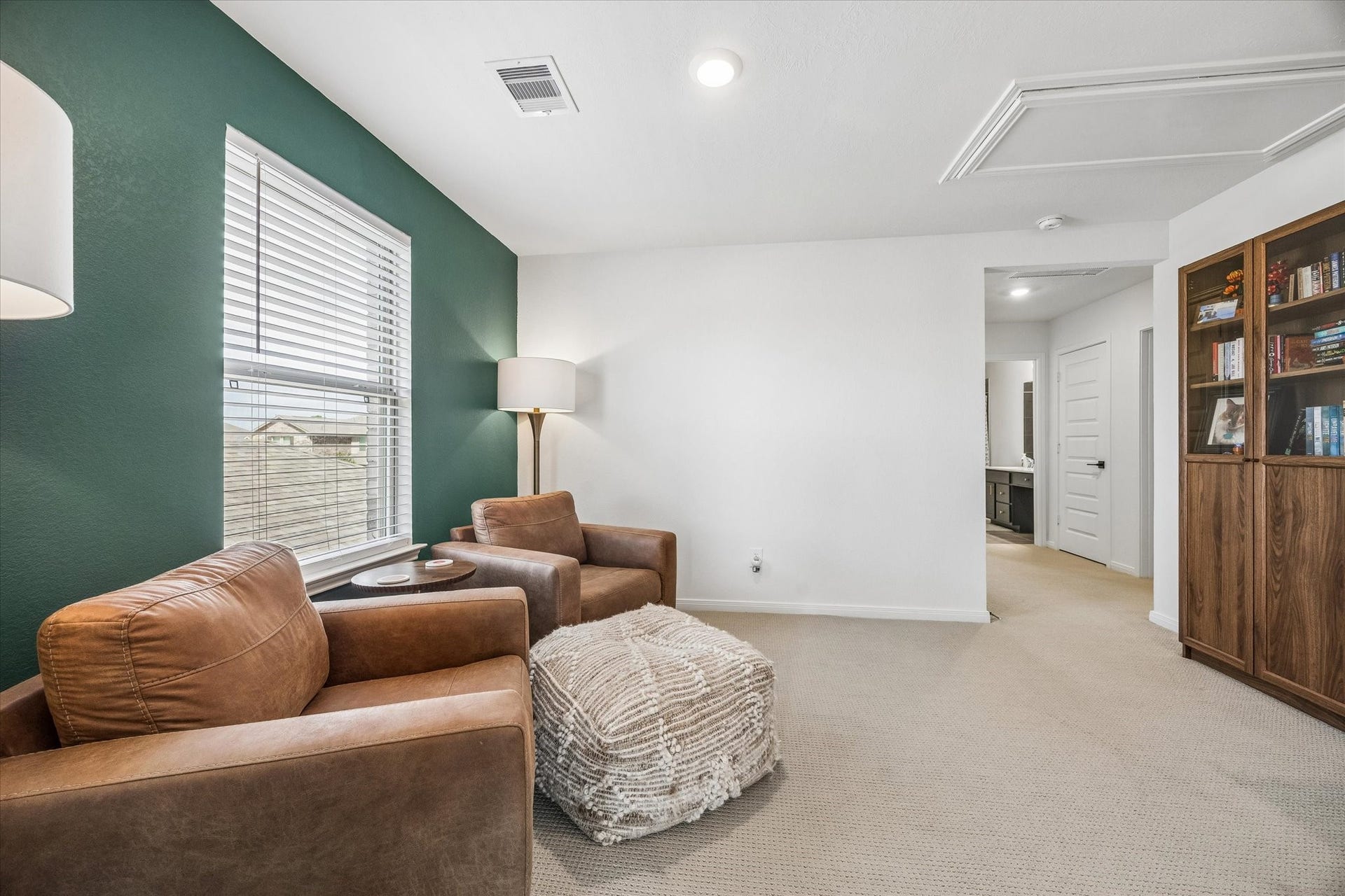 2852 Grand Anse Drive, Katy, TX 77493 Upstairs loft offers a versatile open space ideal for a second living area, game room, home office, or reading nook.