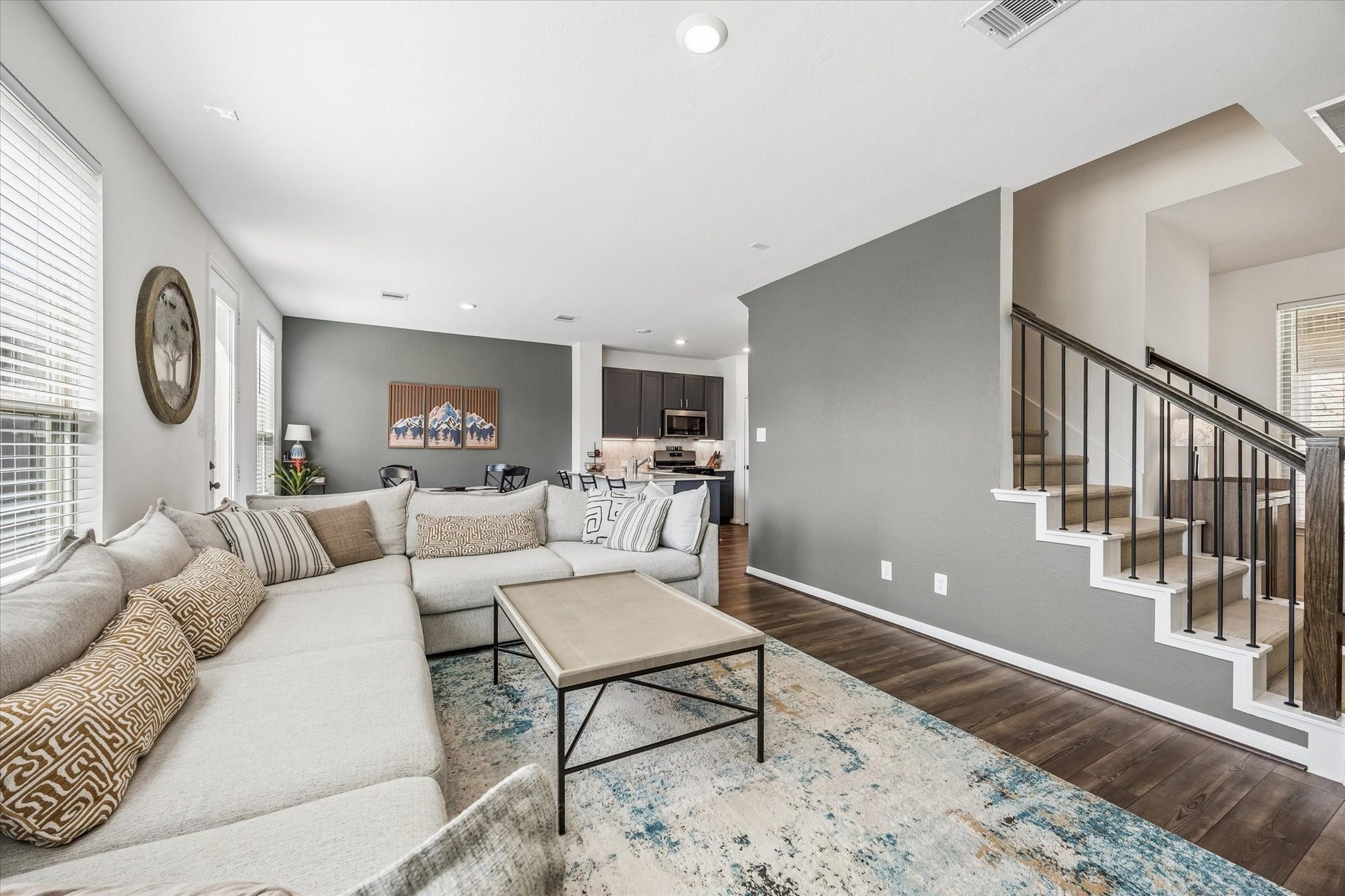 2852 Grand Anse Drive, Katy, TX 77493 Open and inviting living space offering plenty of room to gather, with seamless access to the kitchen, dining area, and the second floor.