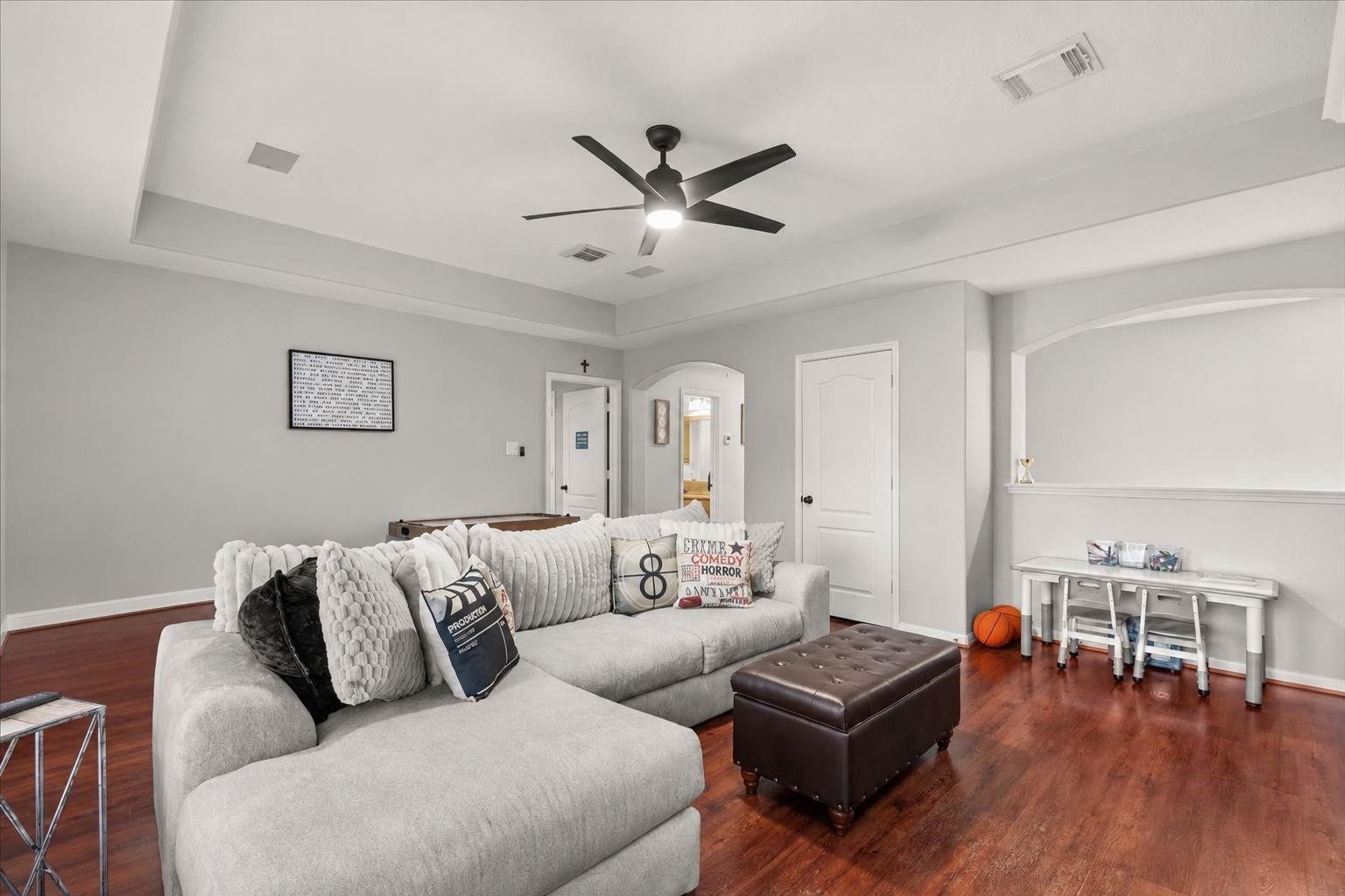 2437 La Rochelle Court, Seabrook, TX 77586 Additional game room view shows the generous layout and flexible seating space.