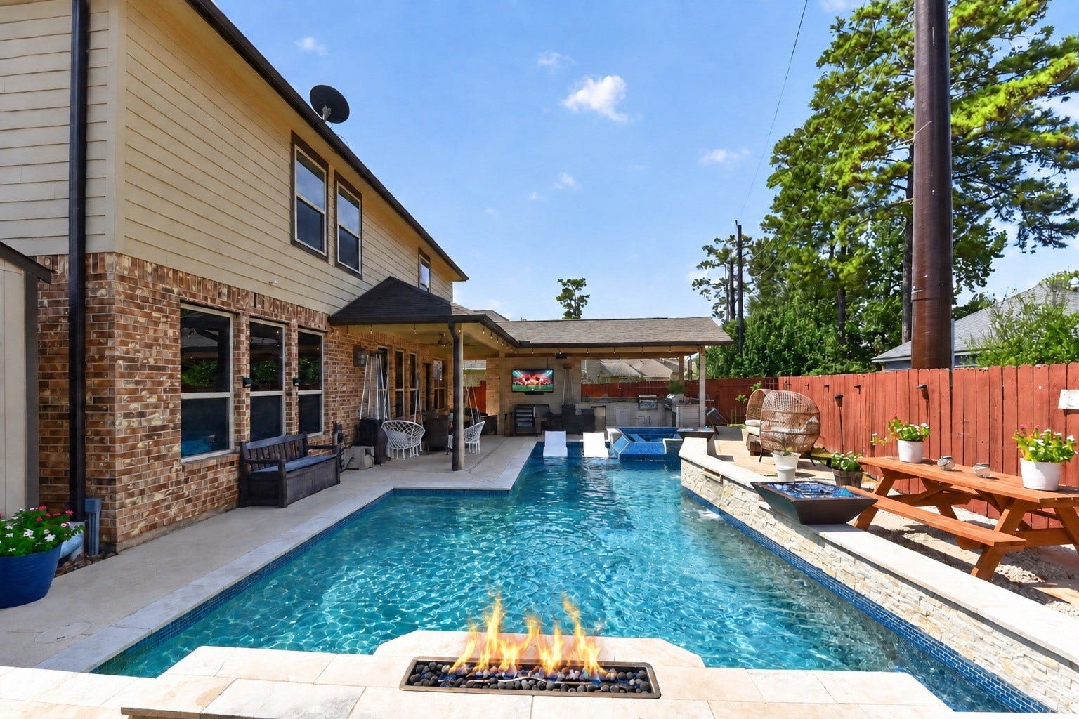 Adjustable flames around the pool perimeter!
