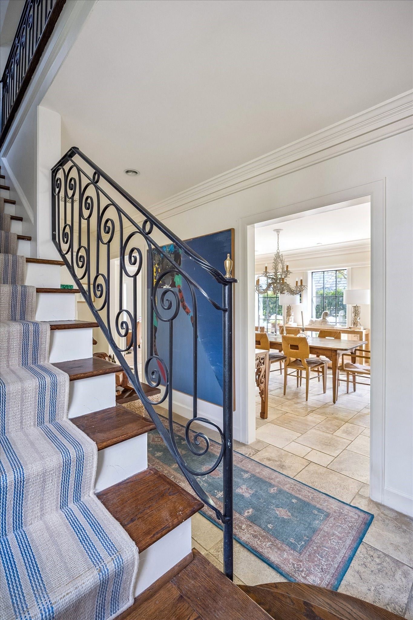1117 Banks, Houston, TX 77006 The iron railing, the stone floors, the moldings all features to expect from architect J.T Rather, Jr.