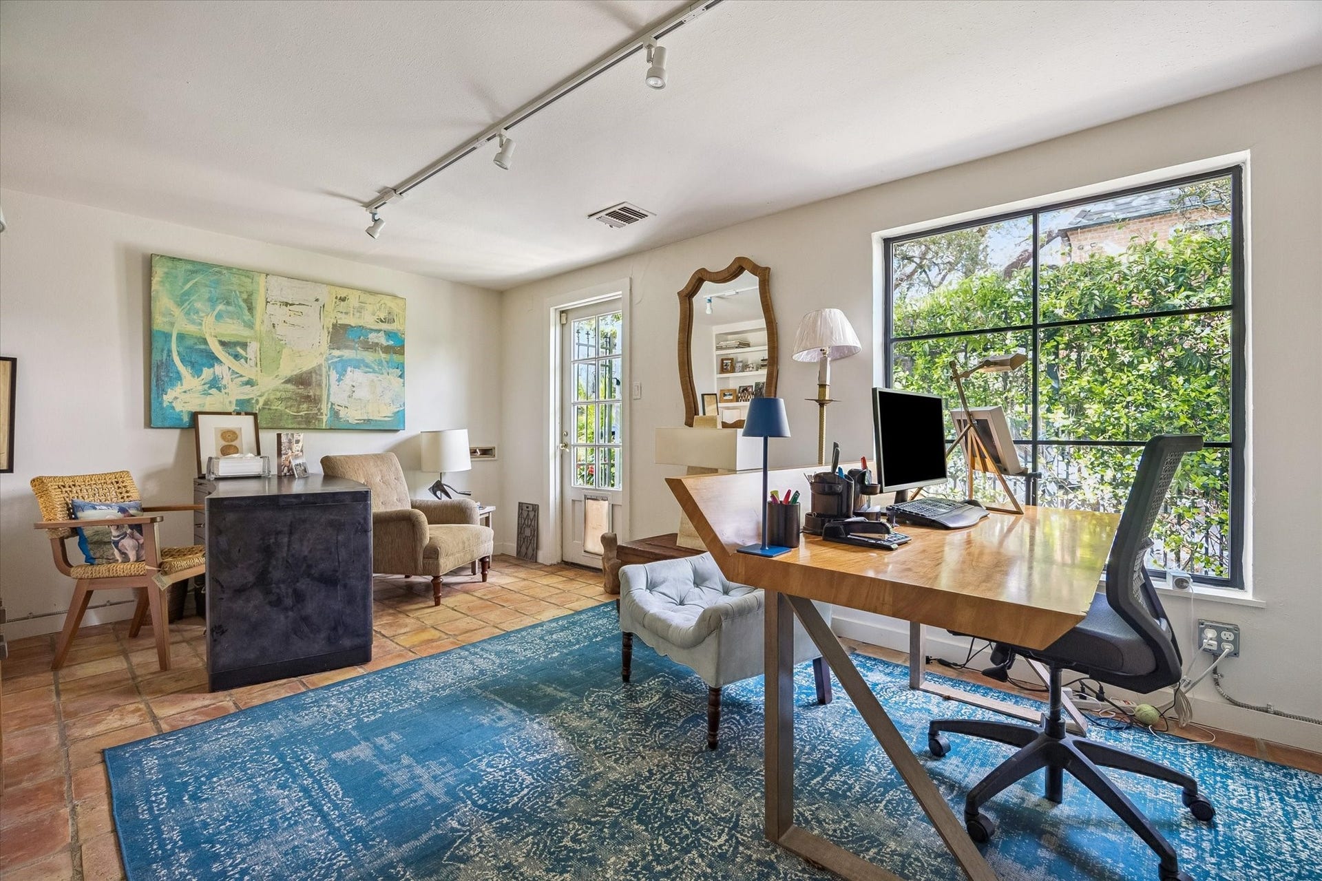 1117 Banks, Houston, TX 77006 The guest cottage has this wonderful work-from-home office with a separate entrance and views to the gardens.