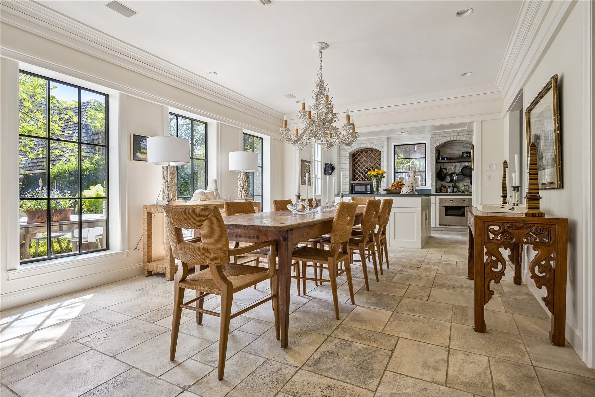 1117 Banks, Houston, TX 77006 Dining room with incredible views to the gardens is open to the kitchen.
