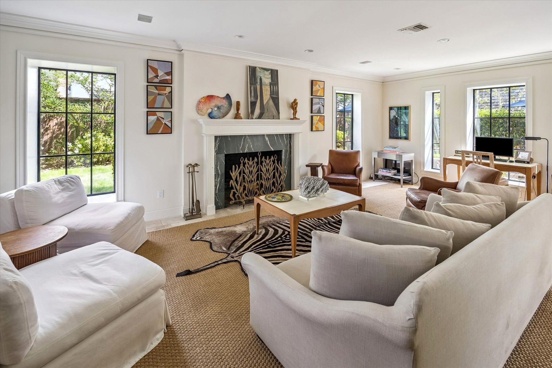 1117 Banks, Houston, TX 77006 This is the light-filled living room with new metal windows that have views to the extensive manicured gardens.