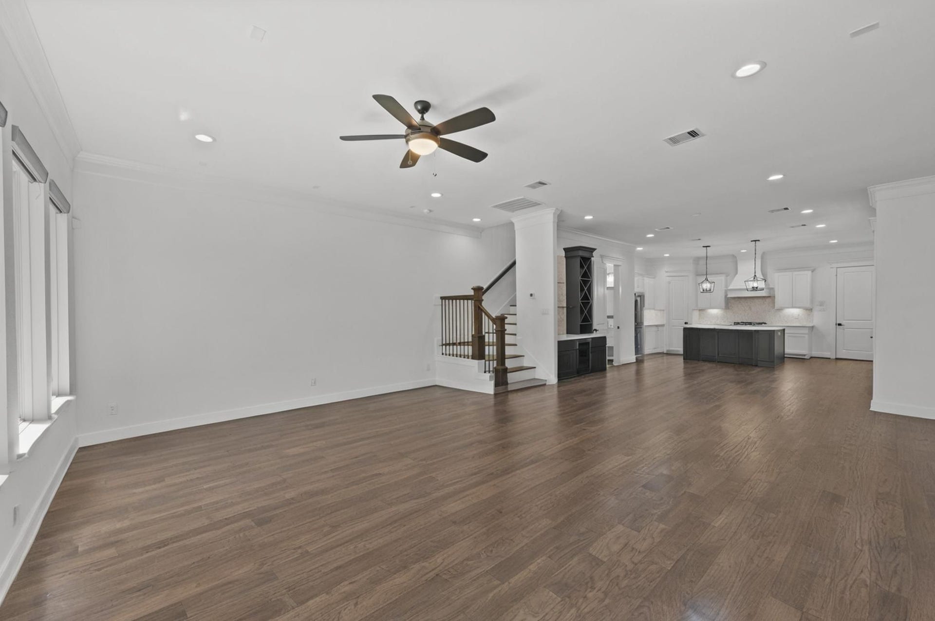 1128 Malone Street, Houston, TX 77007 This view highlights the width of the first-floor living space and the direct connection into the kitchen. The layout keeps the home open without losing definition between areas.
