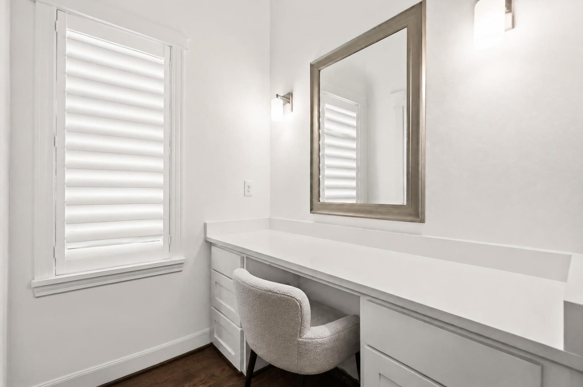 1128 Malone Street, Houston, TX 77007 The dedicated vanity area adds a custom detail to the upstairs suite layout. It creates a polished place for getting ready while keeping storage and function close by.