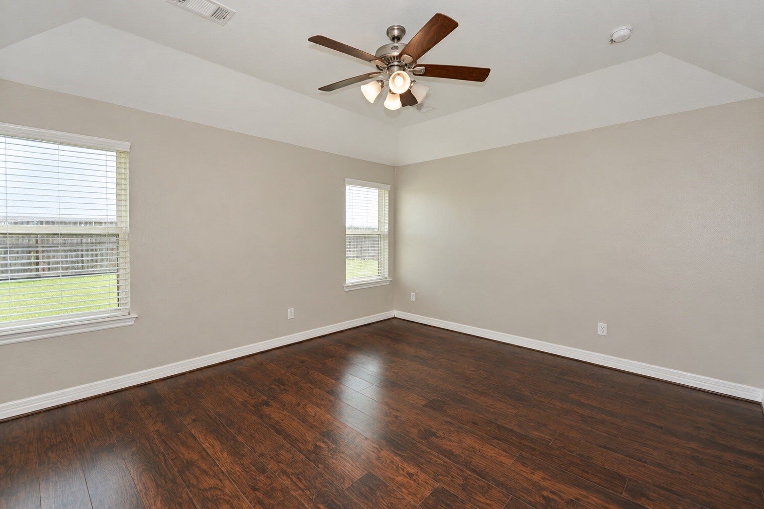 26322 Stonedale View Drive, Richmond, TX 77406 Spacious primary bedroom with two large windows