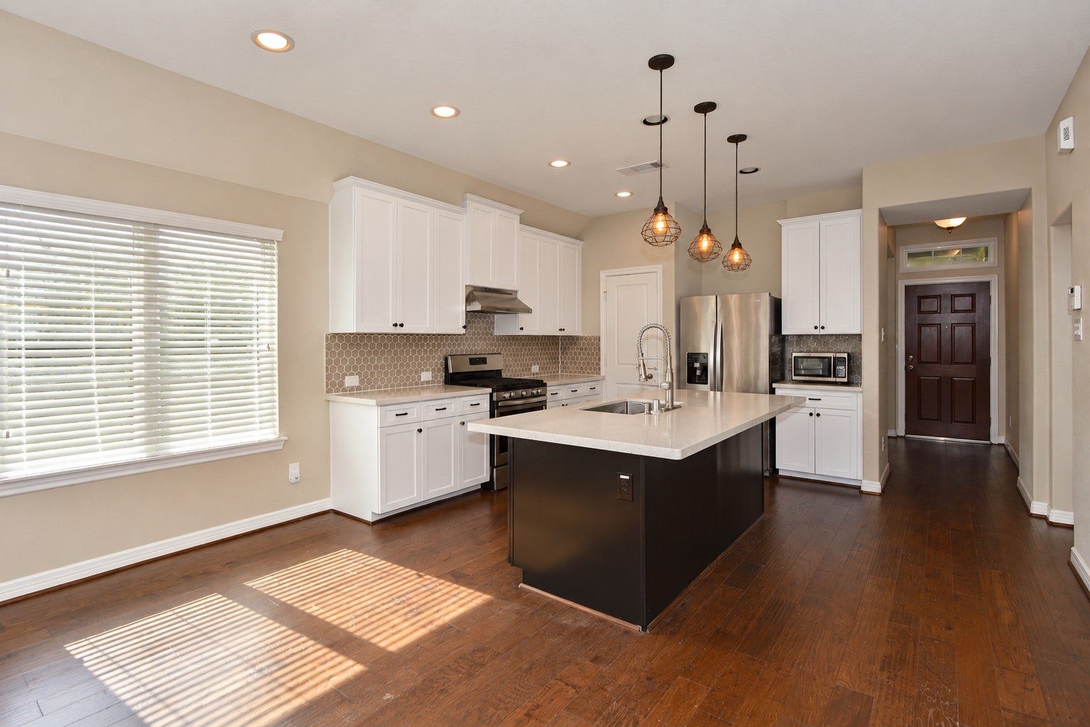 26322 Stonedale View Drive, Richmond, TX 77406 Kitchen view features abundant counter space, cabinet storage and a walk in pantry