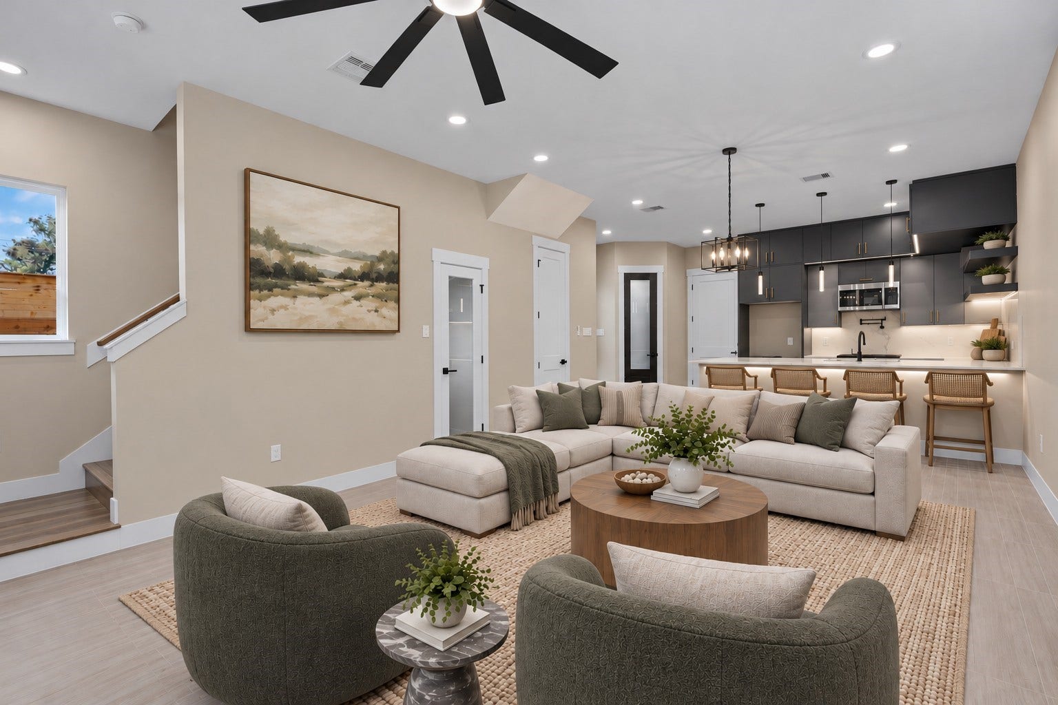 Virtually Staged: The expansive layout offers smooth traffic flow between living zones, making it an inviting centerpiece of the home.