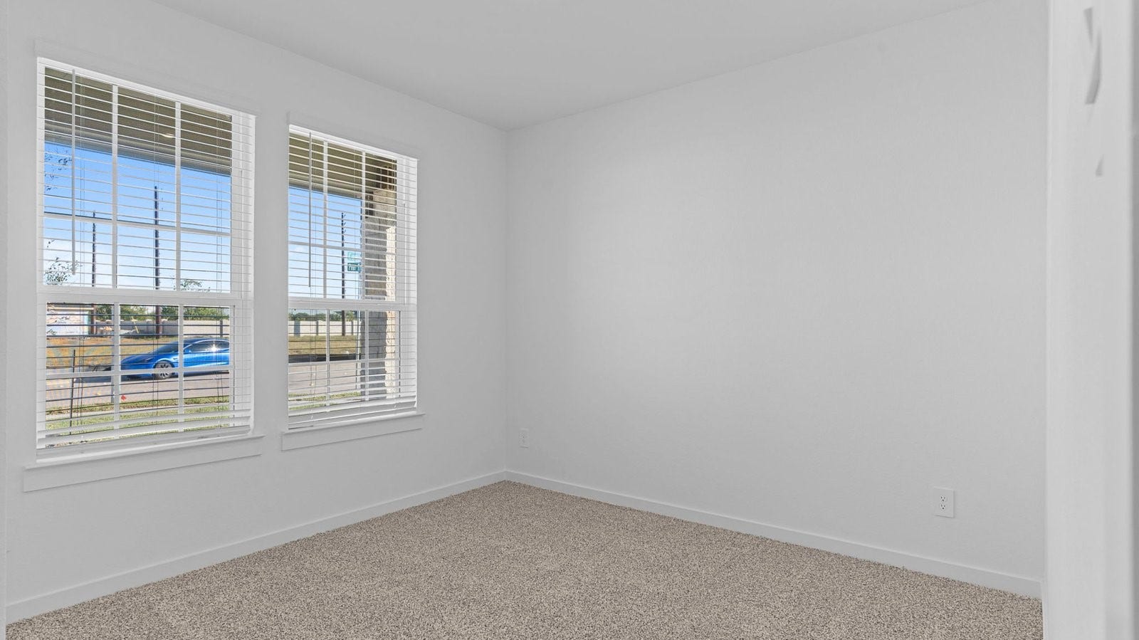 14028 Pine Cliffs Drive, Texas City, TX 77568 Comfortable guest bedroom featuring neutral-toned walls, carpeted flooring, and a separate closet.