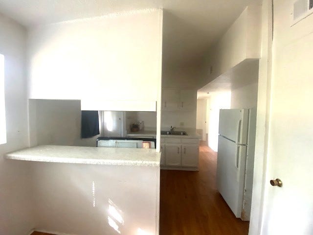 215 Avenue E, South Houston, TX 77587 Cozy breakfast room with breakfast bar and window to view the huge playground area.