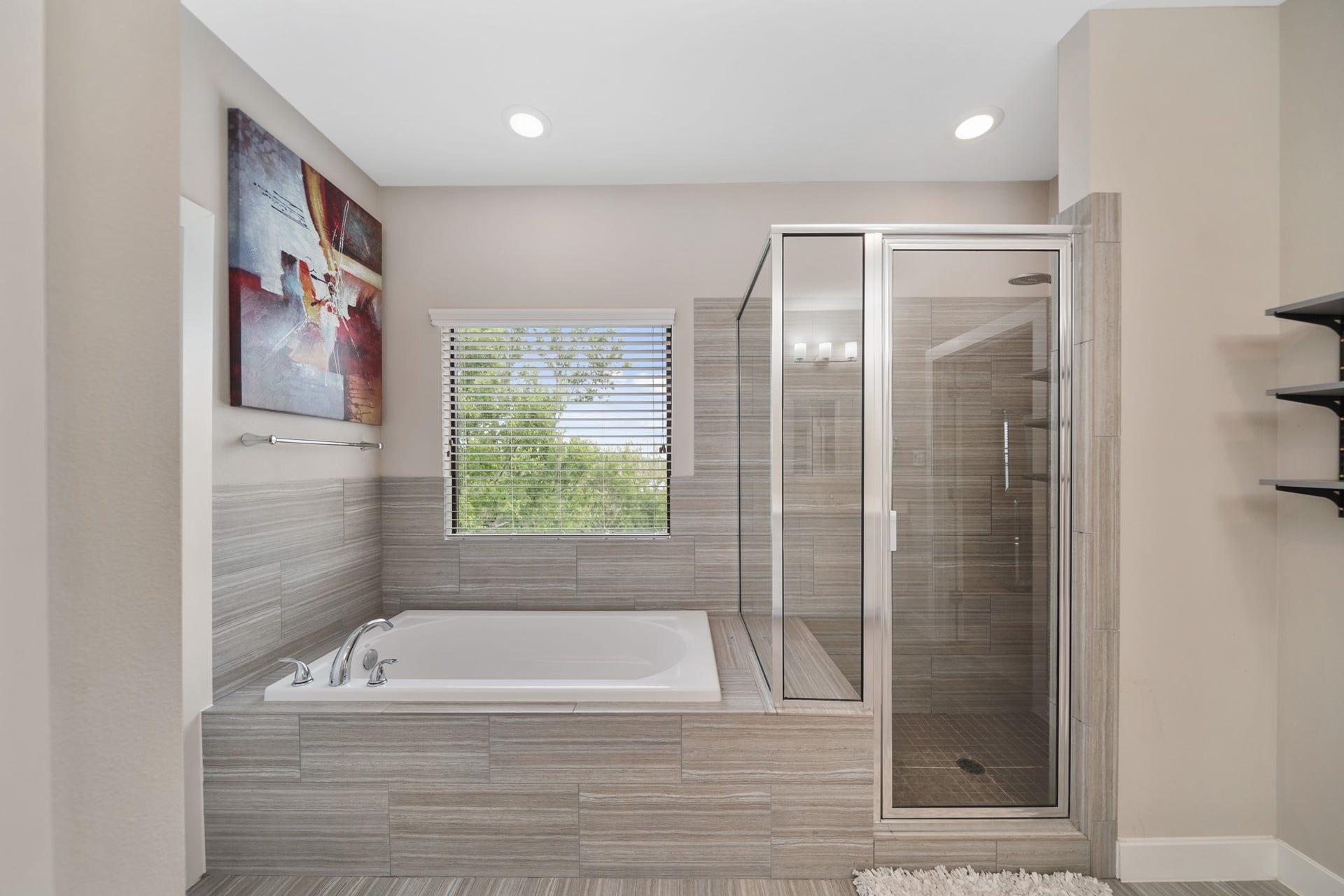 1824 Bonner Street, Houston, TX 77007 Relax & unwind in the tile surrounded soaking tub with window & blinds above and nearby tile surrounded glass enclosed walk-in shower with seating.