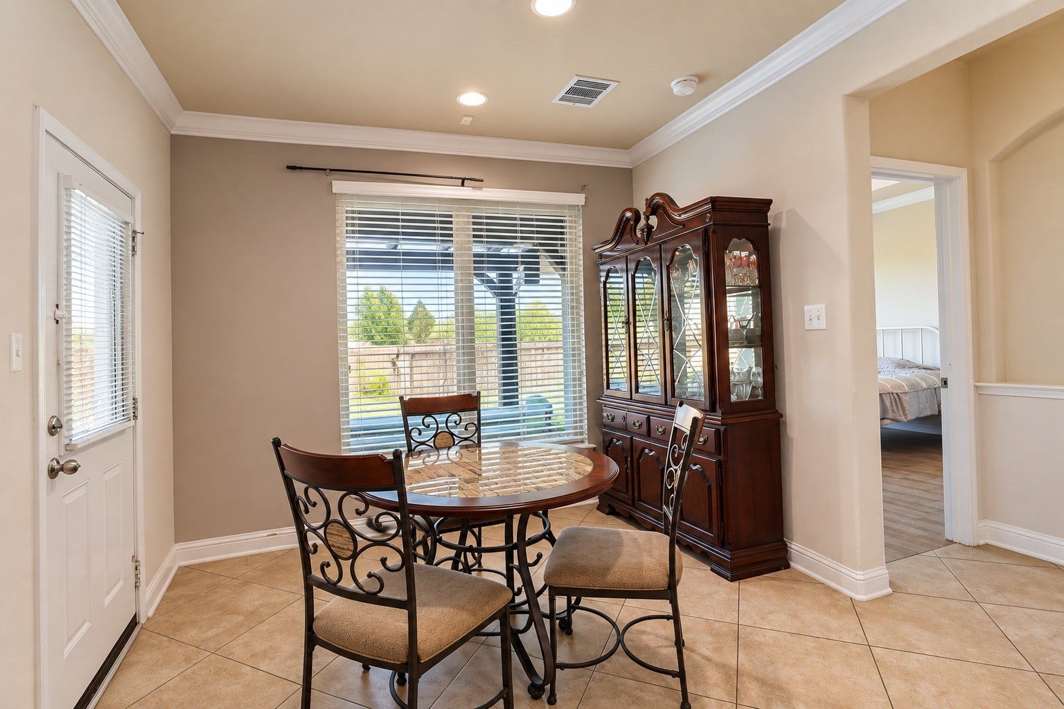 3913 Ginger Fields Court, Pearland, TX 77581 Separate Dining Area with a backyard view, large windows