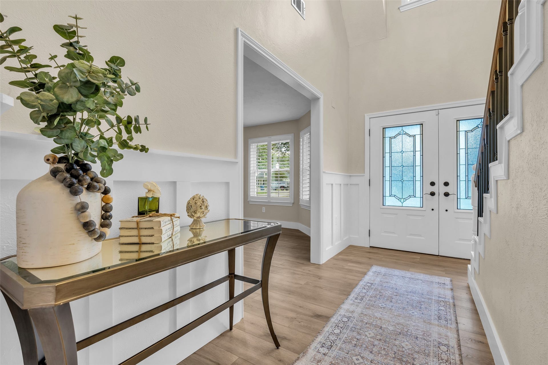 Additional view of entryway with living space to the left
