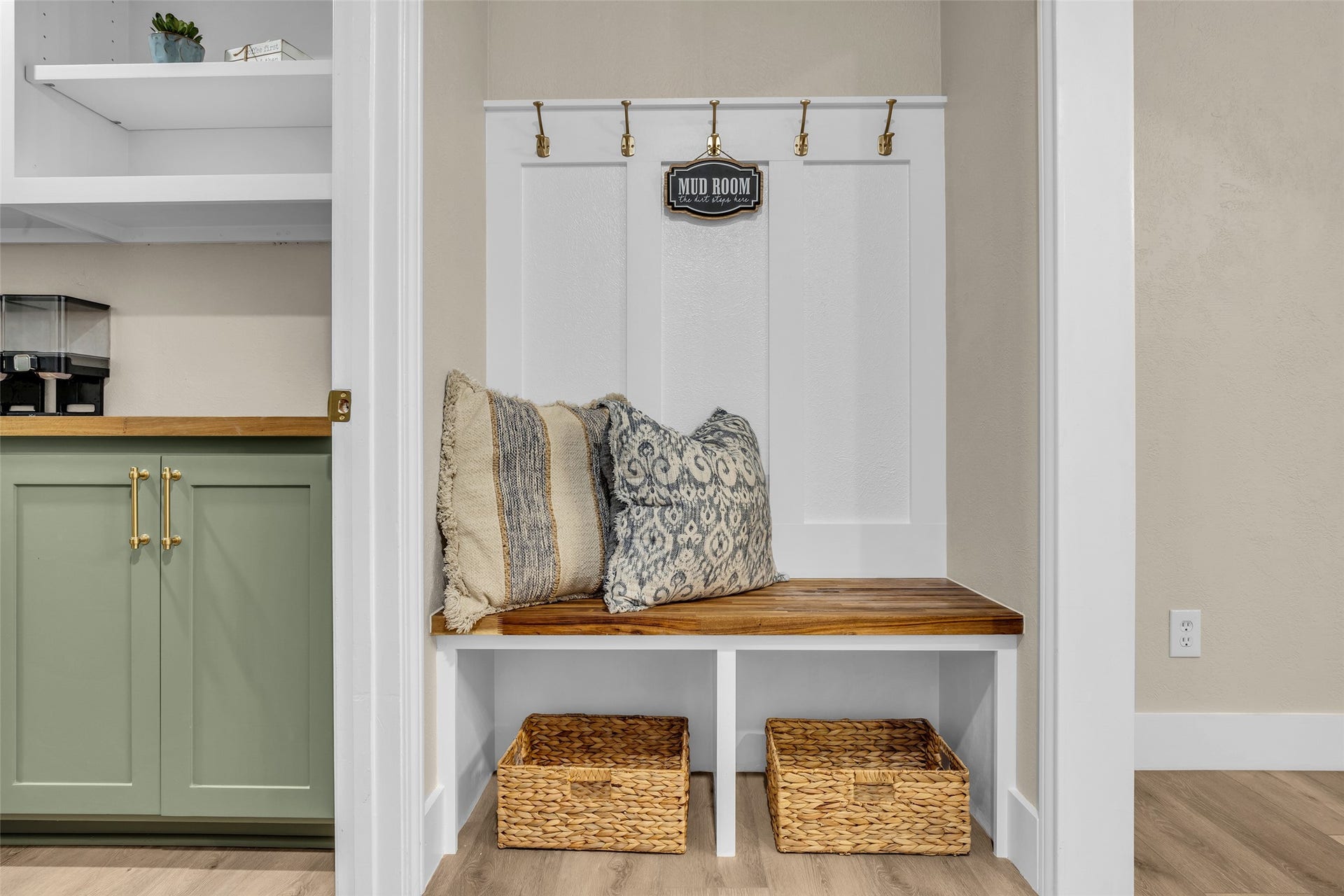 Cozy Mud area right off the breezeway entry and laundry space, next to the oversized Butler like walk in pantry