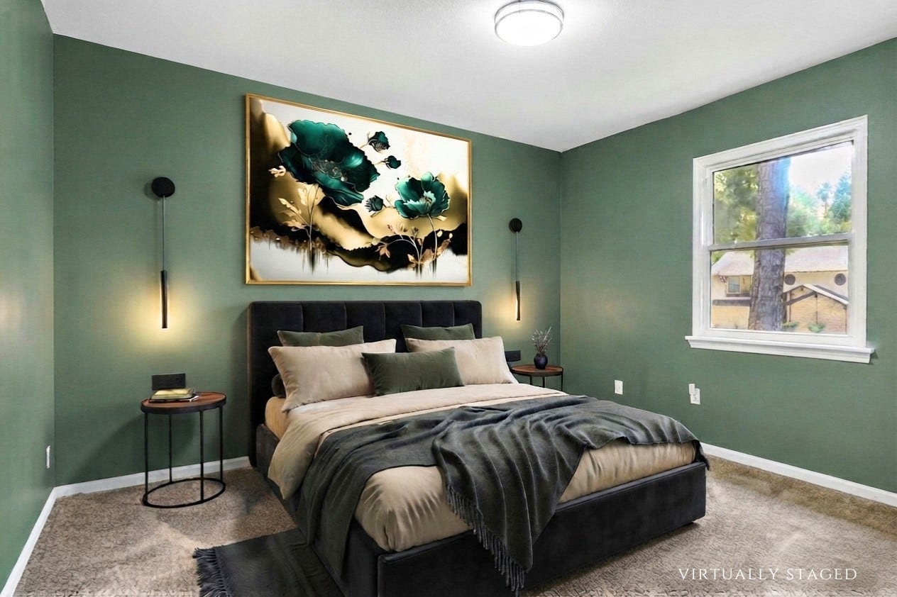10818 Elmdale Drive, Houston, TX 77070 Virtually staged to showcase the scale of this upstairs bedroom, comfortably accommodating substantial furnishings with convenient access to the Jack-and-Jill bathroom.