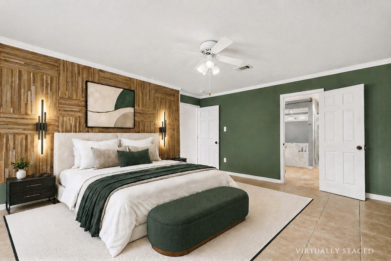 10818 Elmdale Drive, Houston, TX 77070 Virtually staged to showcase the exceptional scale of the primary bedroom, comfortably accommodating substantial furnishings while highlighting the striking accent wall and private bath access.