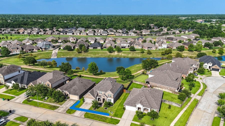 Property photo for 24506 Raven Cliff Falls Drive, Tomball, TX