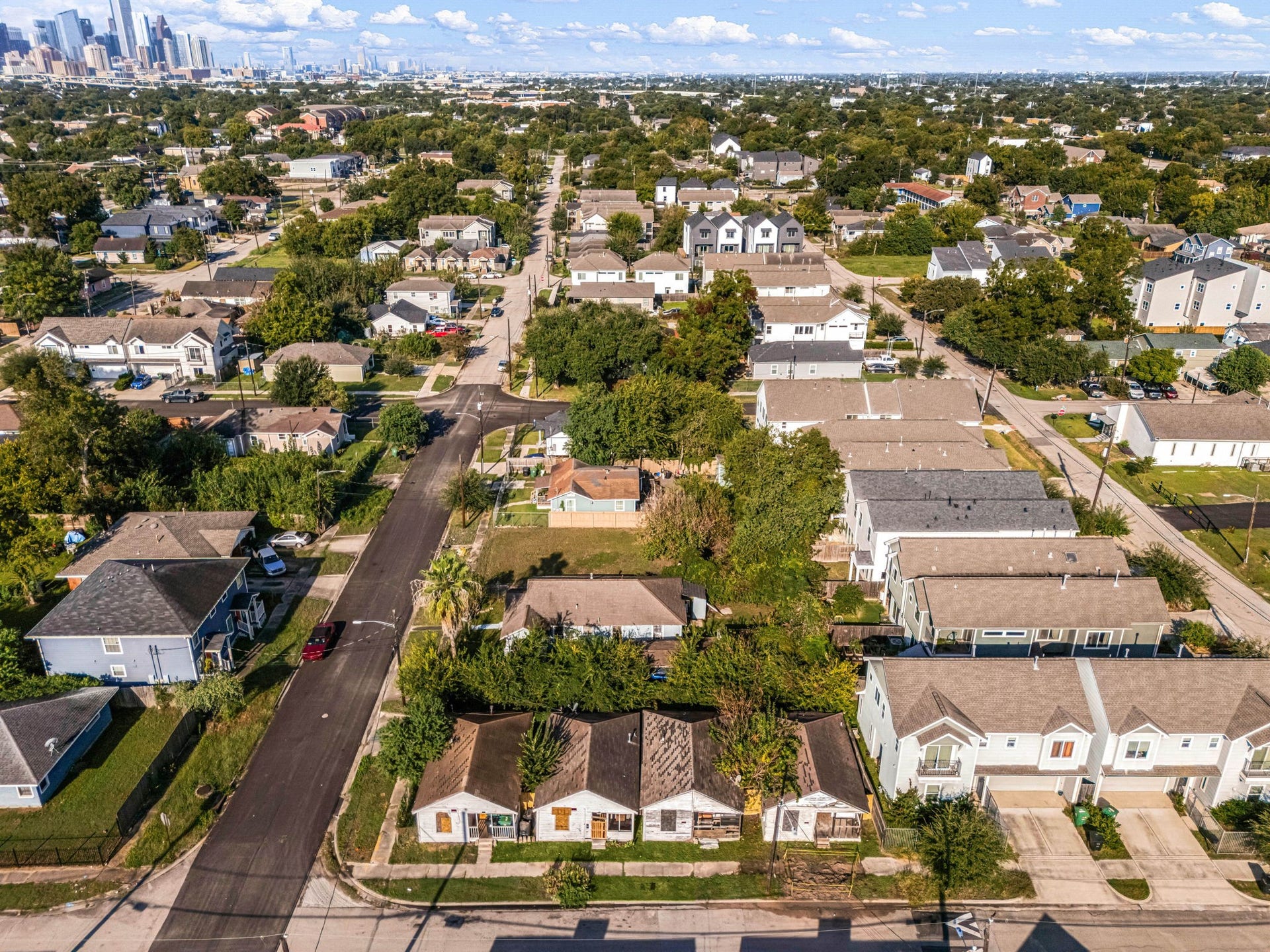Four units on a 5,000 square foot lot surrounded by new construction development