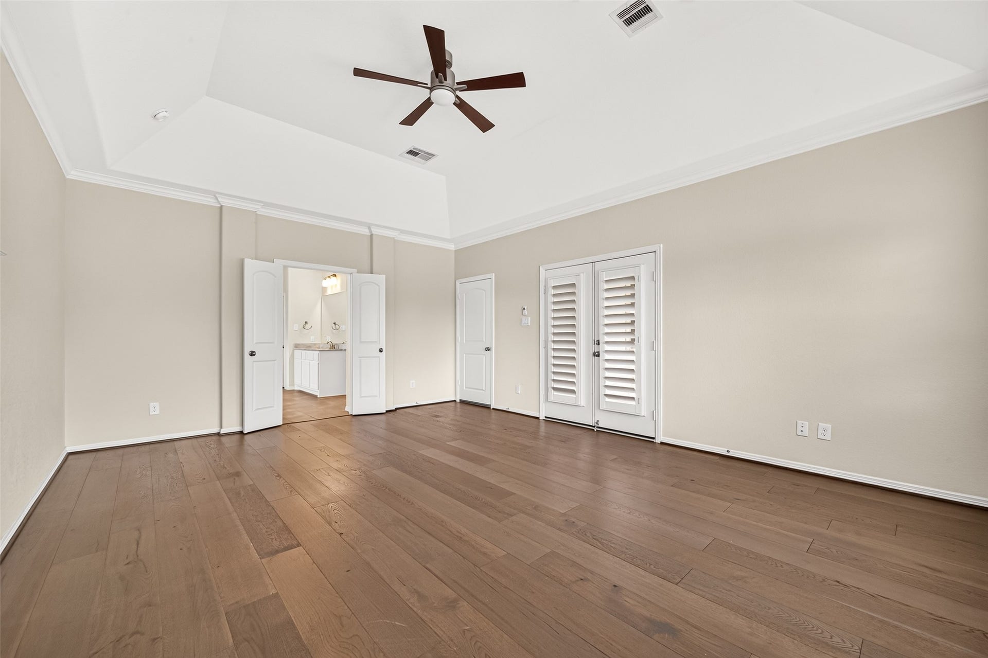 Primary suite on 2/F with direct access to balcony