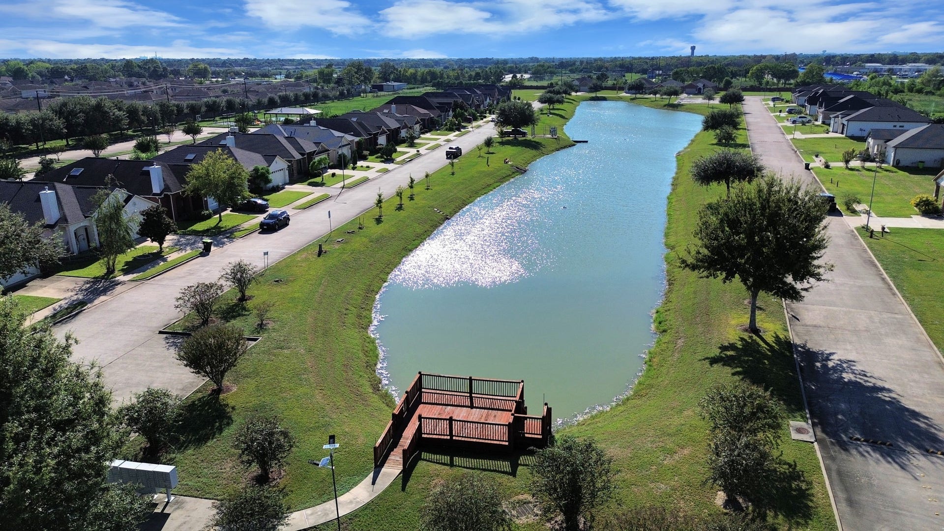 2139 Kottayam Drive, Missouri City, TX 77489 Enjoy beautiful water views from the aerial view of this home.