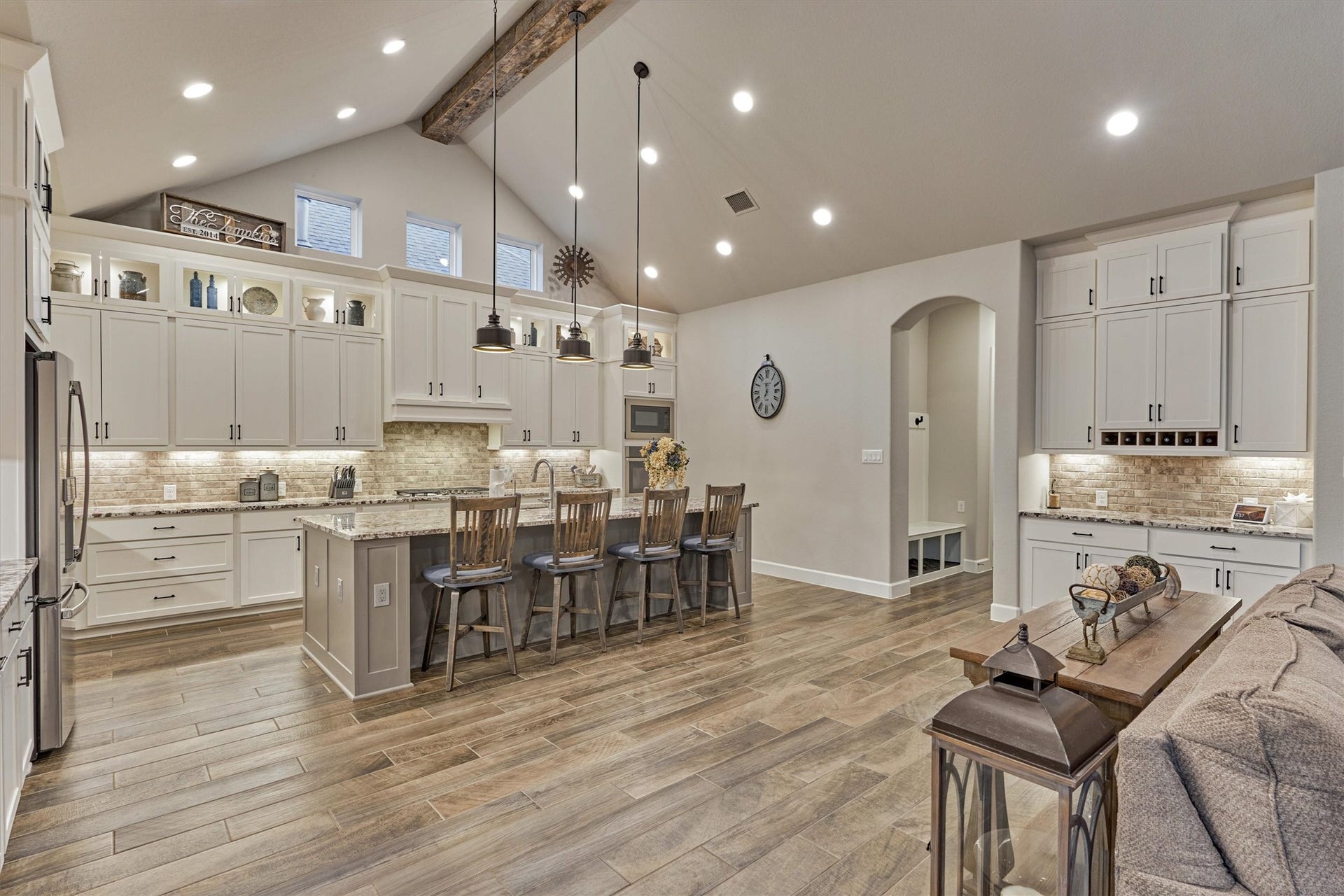 305 Pewter Sky Drive, Montgomery, TX 77316 The expansive open layout flows beautifully into the kitchen with additional space for a breakfast table in betweenperfect for everyday living & entertaining. Note the built-in dry bar/butler's pantry space!