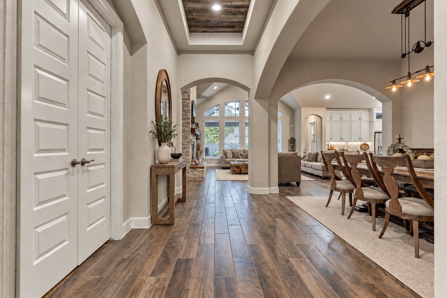 305 Pewter Sky Drive, Montgomery, TX 77316 A seamless view into the heart of the home, with graceful archways, and double doors leading to the spacious & private game room.