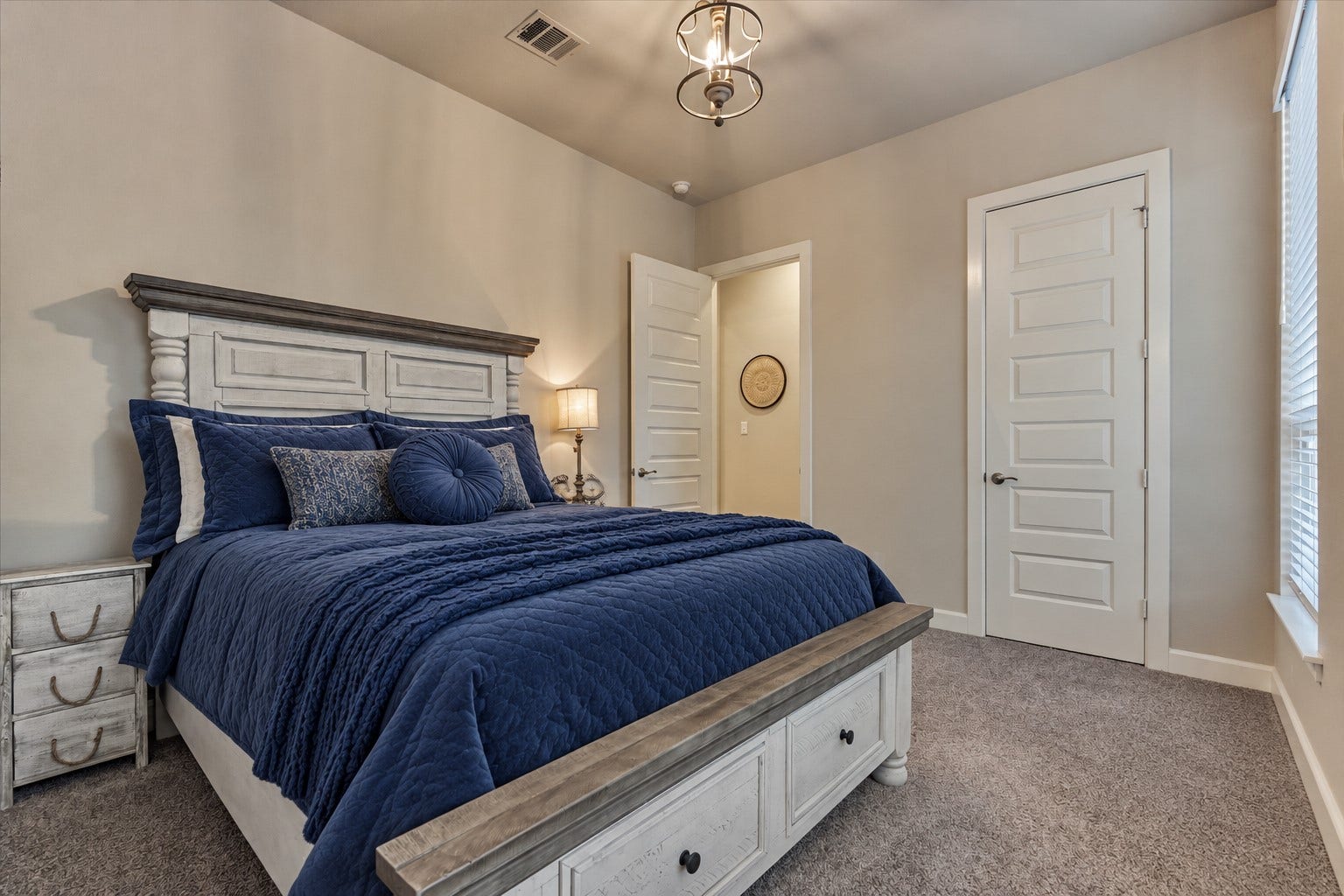 305 Pewter Sky Drive, Montgomery, TX 77316 Secondary Bedroom #2 is generously sized with views of pool, an upgraded light fixture and its own private en-suite bathan ideal setup for guests.