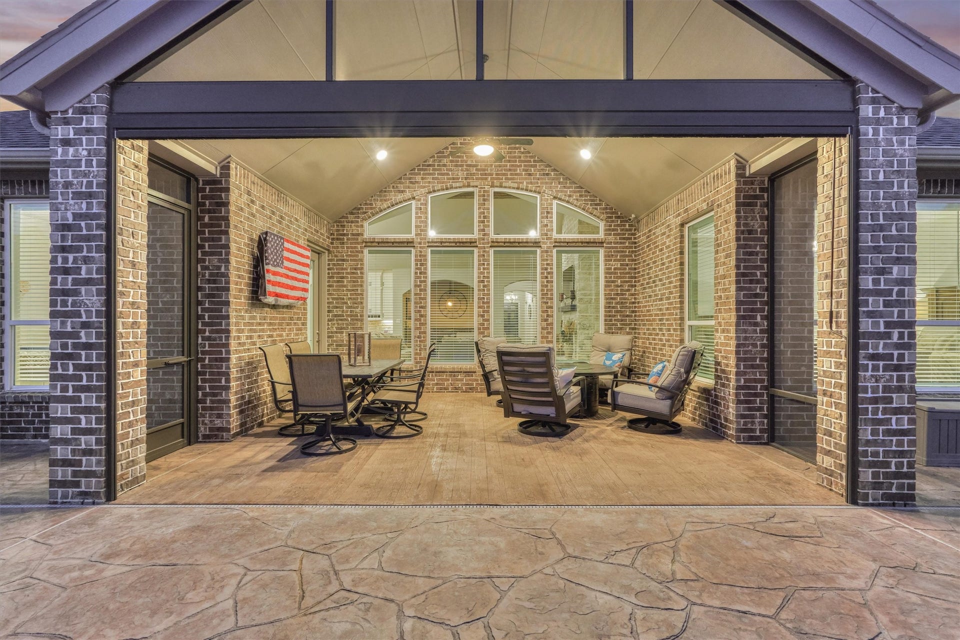 305 Pewter Sky Drive, Montgomery, TX 77316 An entertainers dream! This extended covered patio creates an incredible outdoor living space with a full screen enclosure and power retractable screen, allowing you to open it completely to the backyard or close it off for comfortable, bug-free enjoyment.