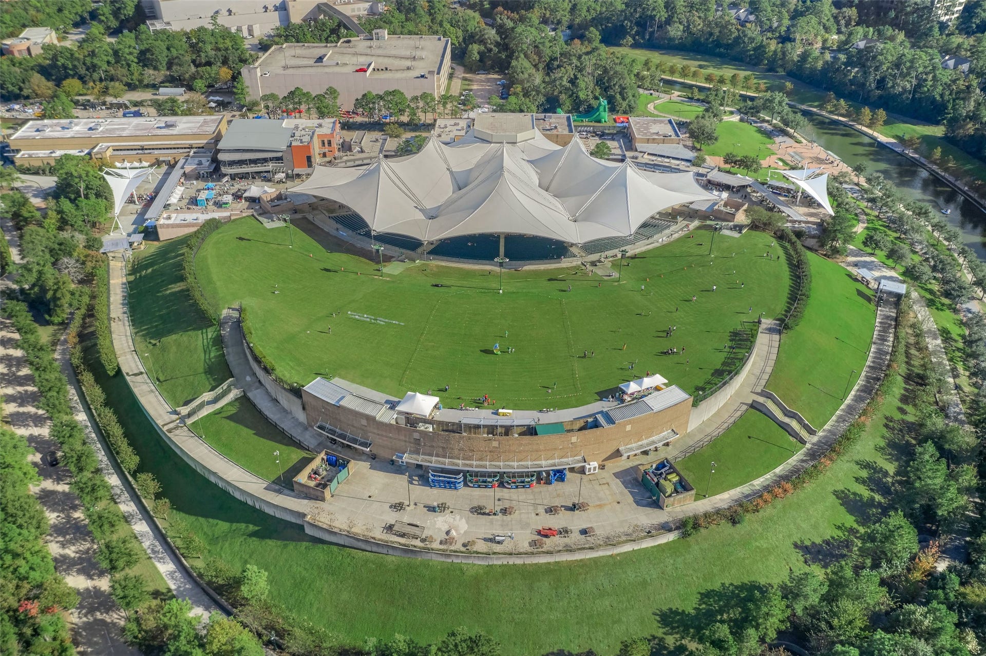 7 Dorset Square, The Woodlands, TX 77381 Cynthia Woods Mitchell Pavilion sometimes called The Woodlands Pavilion or simply The Pavilion, is a concert amphitheater. It caters to both the performing arts and contemporary artists and is also available for rental.
