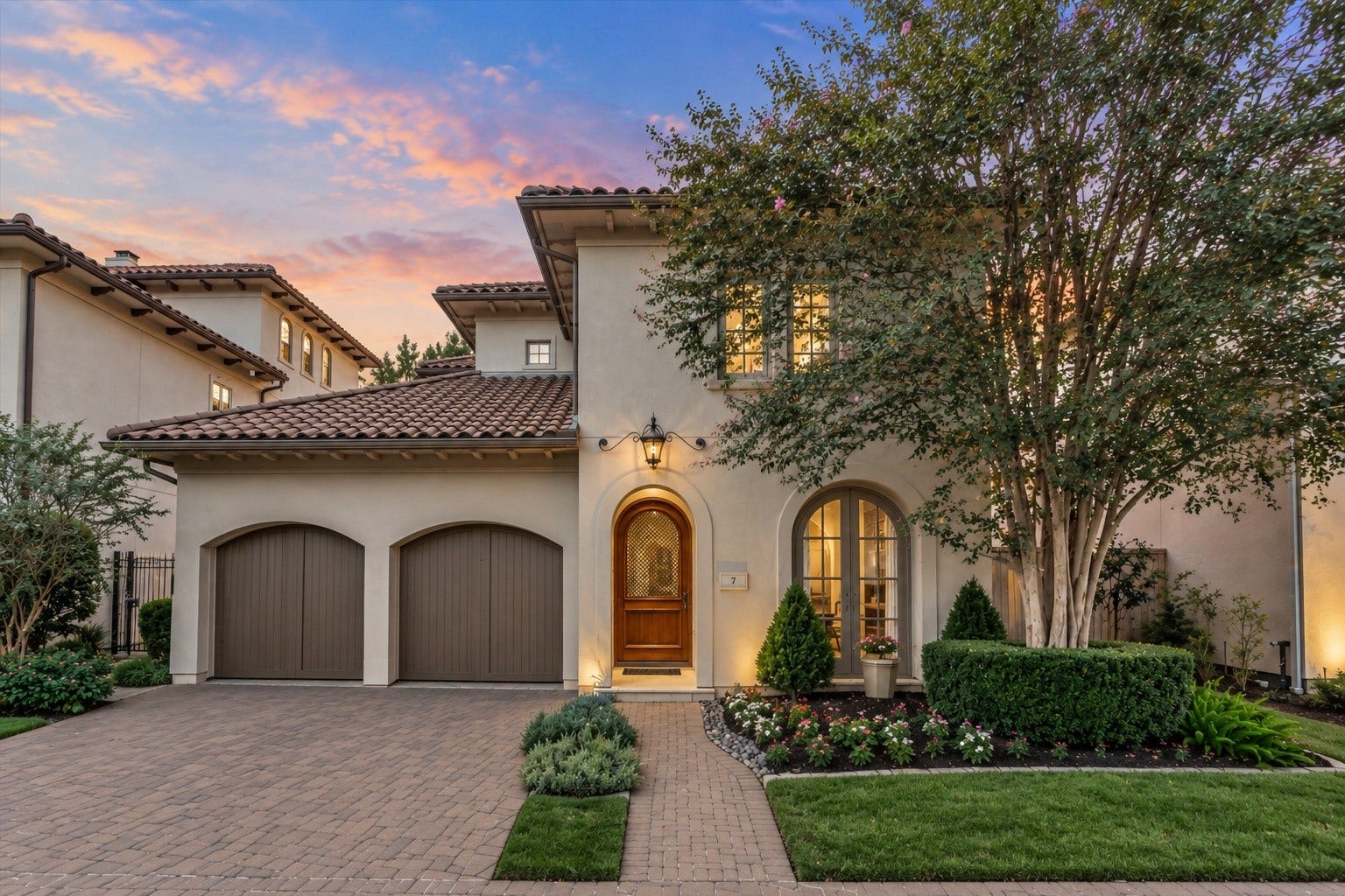 7 Dorset Square, The Woodlands, TX 77381 Architectural distinction meets effortless lock-and-leave living in this Robert Dame-designed garden estate in gated The Pointe of Panther Creek, with views of Lake Woodlands. Photo is virtually staged/enhanced.