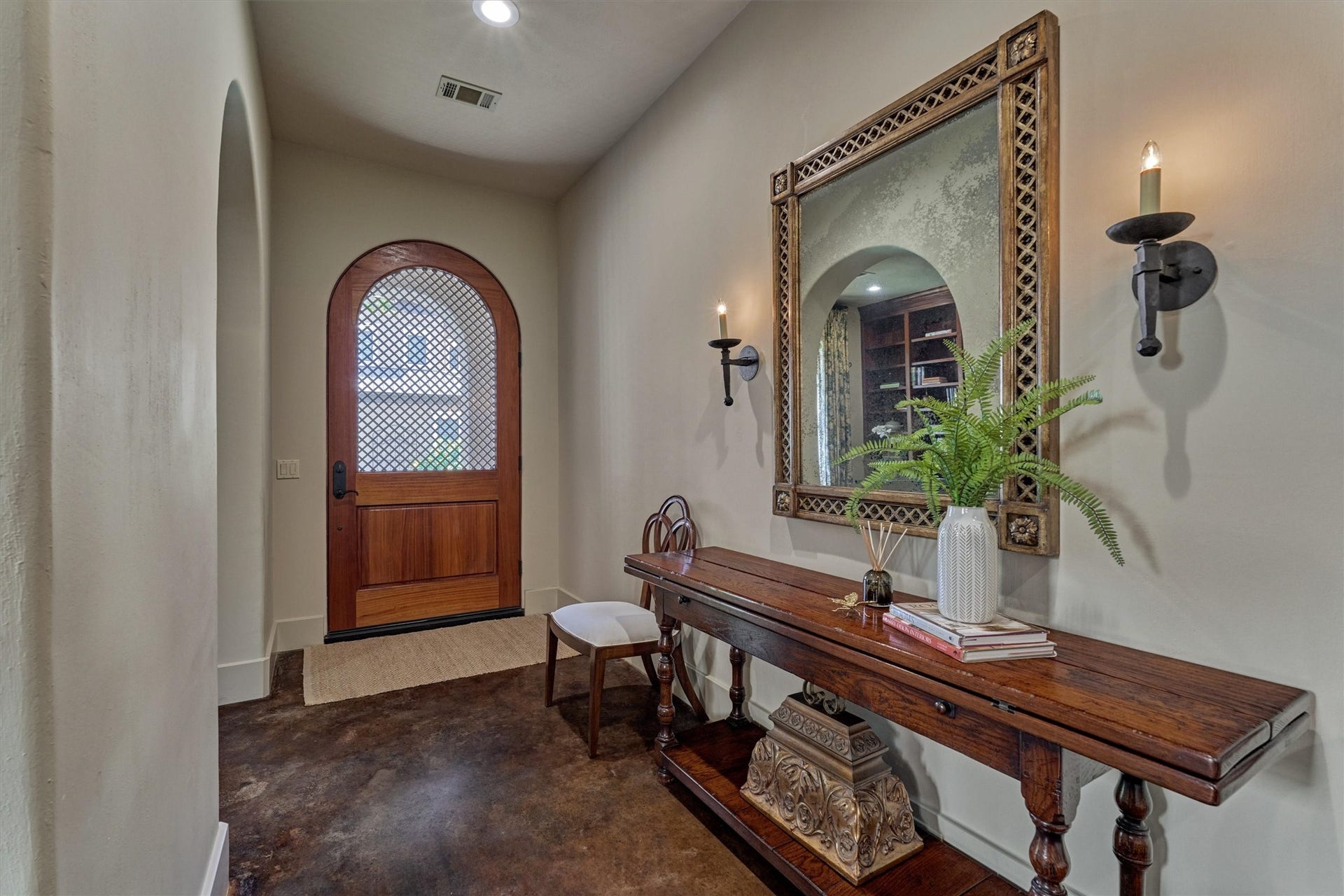 7 Dorset Square, The Woodlands, TX 77381 Luxury finishes include stained concrete floors, solid mahogany doors, inset cabinetry, modern kerf trimless doorframes and LED lighting.