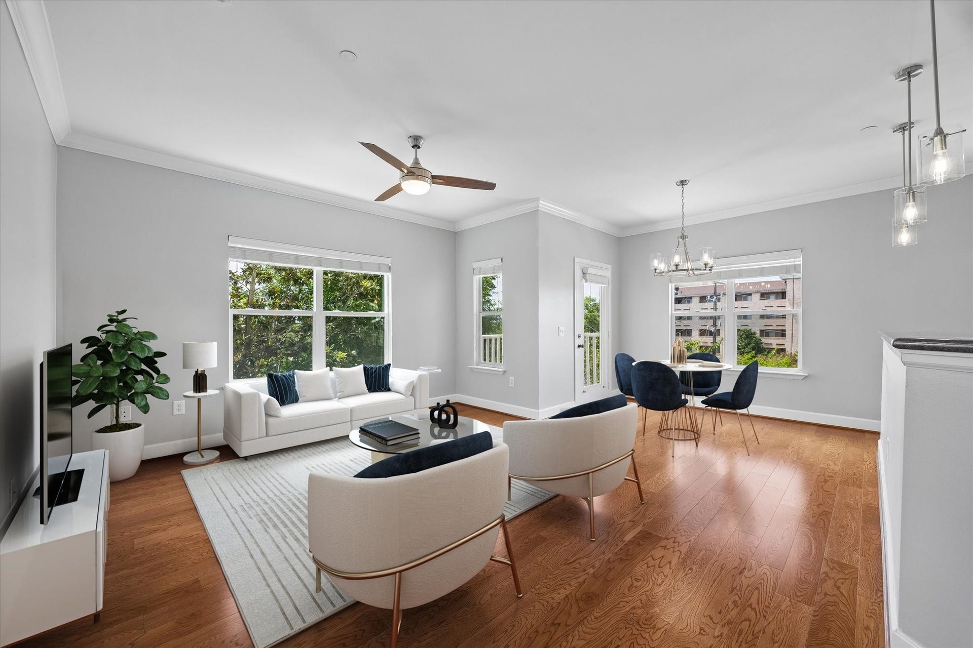 2203 Dorrington Street Street, #205, Houston, TX 77030 This is a bright and modern living-dining area with large windows and so much natural light. It features an updated ceiling fan, contemporary lighting, and a neutral color palette, creating a welcoming and airy space. New ceiling fans are featured throughout the home.