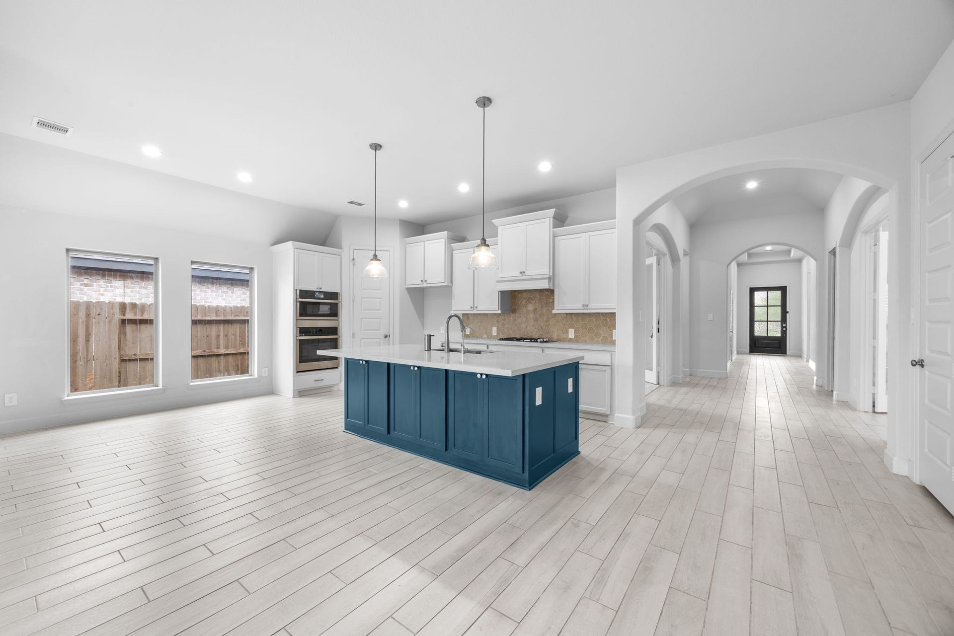 726 Fall Rock Branch Drive, Conroe, TX 77304 Open-concept kitchen designed for effortless entertaining and comfortable everyday living.