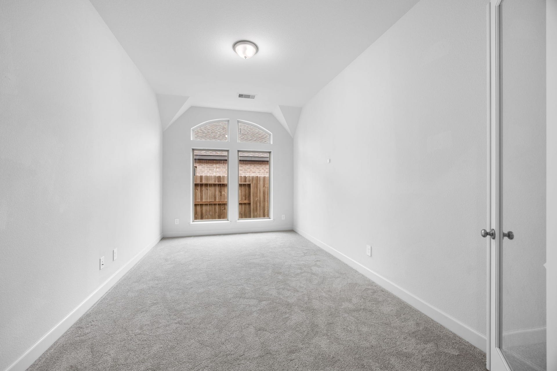 726 Fall Rock Branch Drive, Conroe, TX 77304 Bright, comfortable bedroom with a large window and plenty of room to make the space your own.